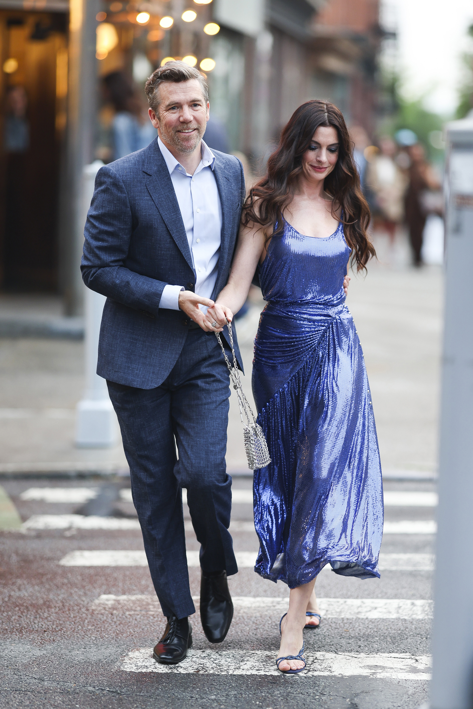 Patrick Brammall and Anne Hathaway seen on the set of The Devil Wears Prada 2 in Brooklyn on August 5, 2025 in New York City