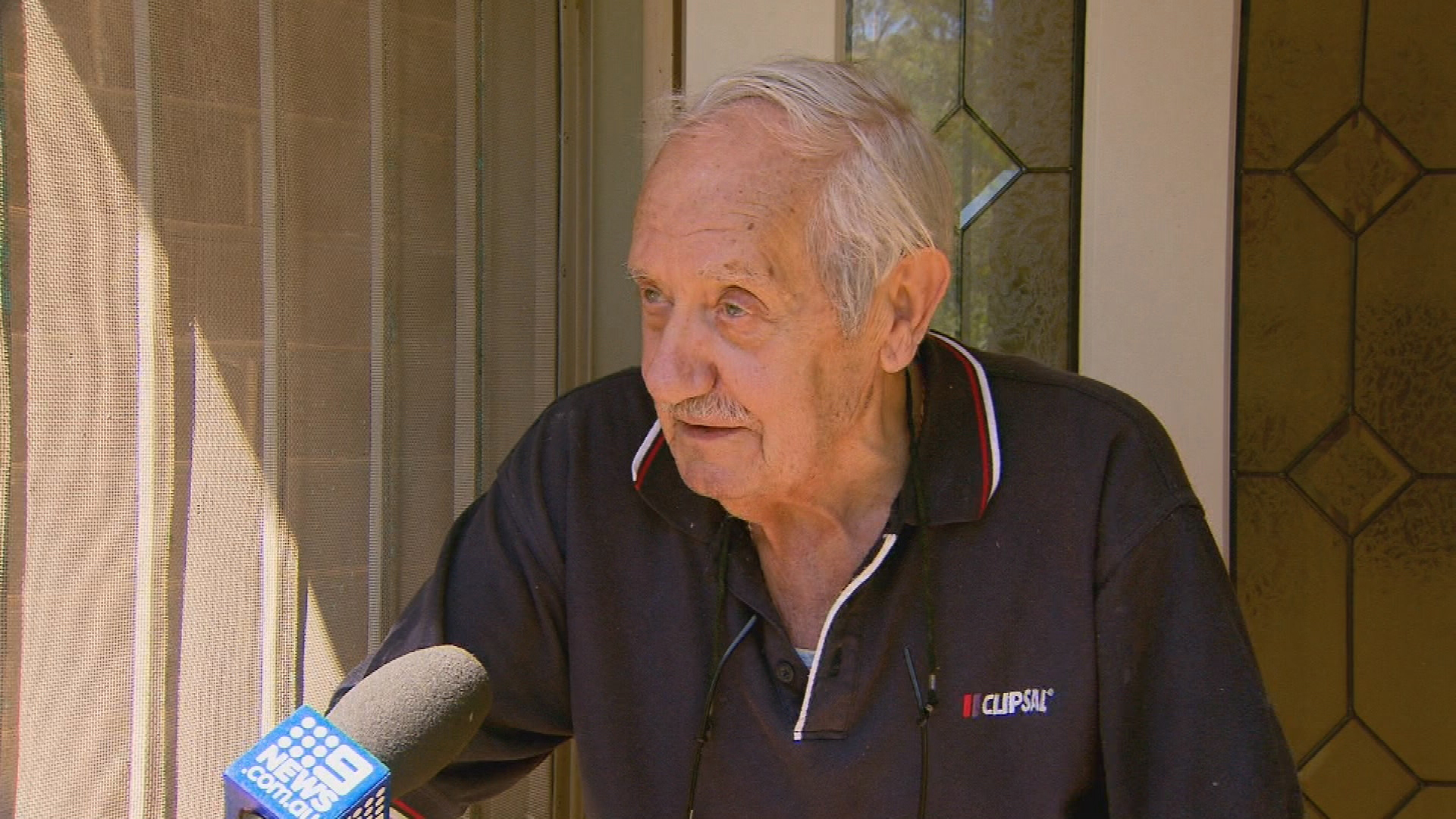 An elderly man is lucky to be alive after a massive Eucalyptus tree fell on his Melbourne home. 