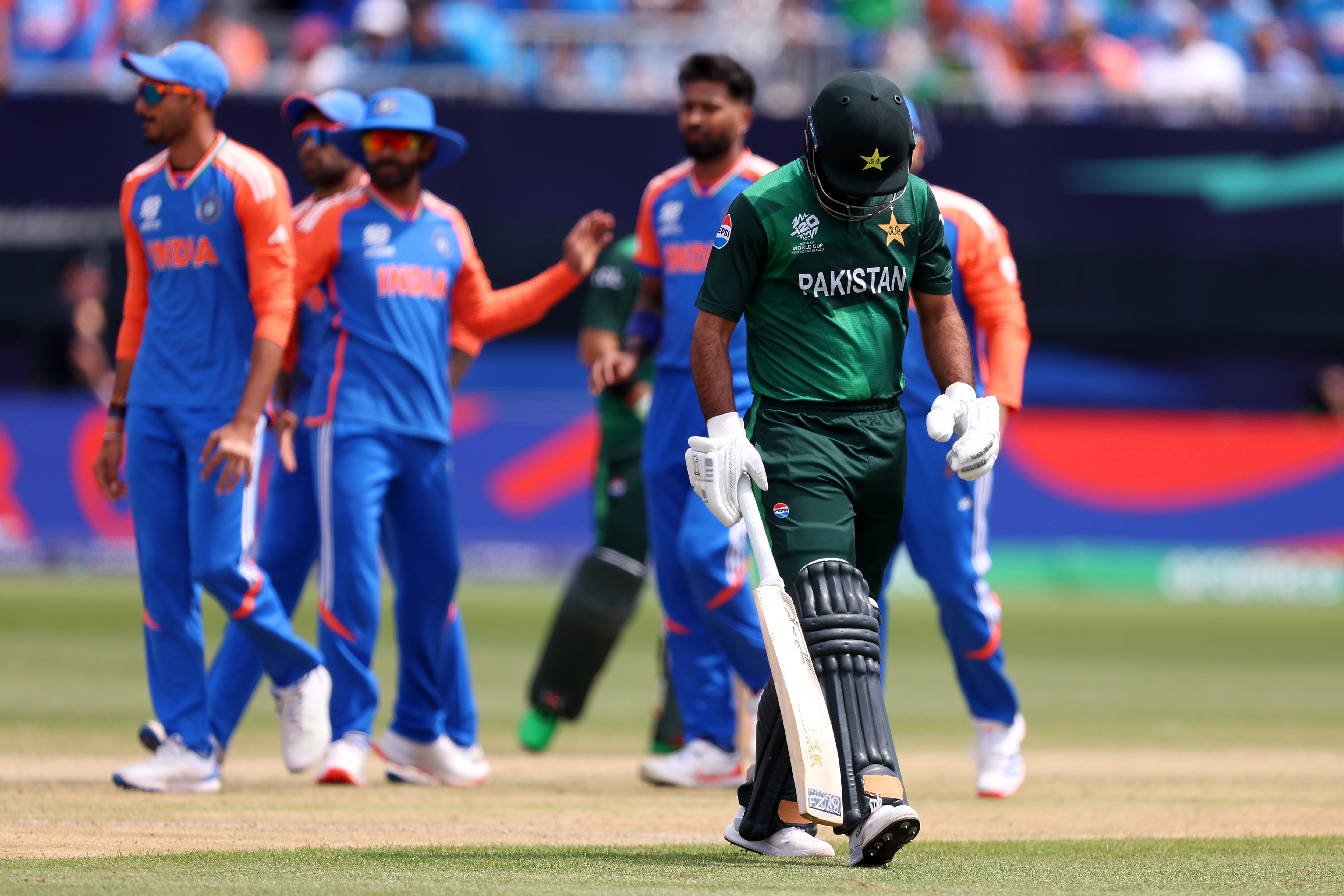 Fakhar Zaman of Pakistan leaves the field after being dismissed during the ICC Men's T20 Cricket World Cup West Indies & USA 2024 match between India and Pakistan at Nassau County International Cricket Stadium on June 09, 2024 in New York, New York. (Photo by Robert Cianflone/Getty Images)