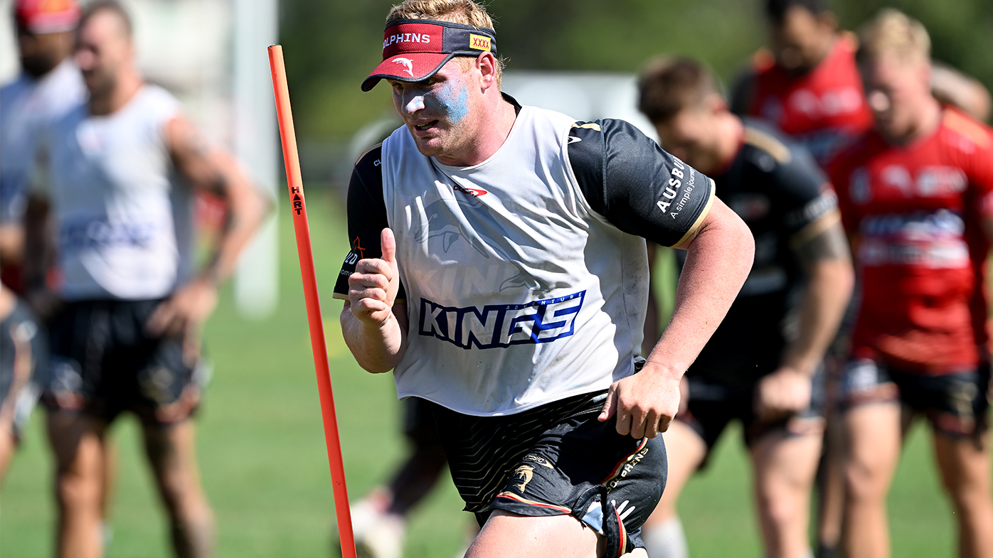 Tom Flegler runs during a Dolphins pre-season training session.