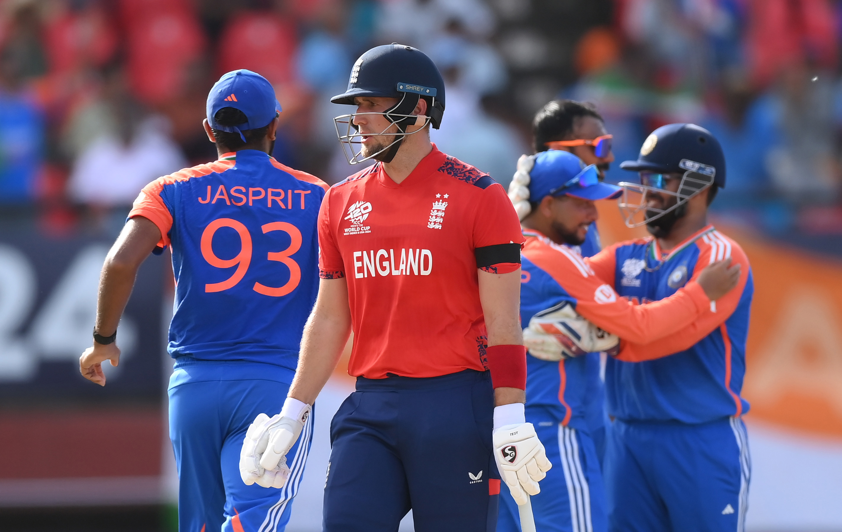 Liam Livingstone of England reacts as he walks off after being run out by India.