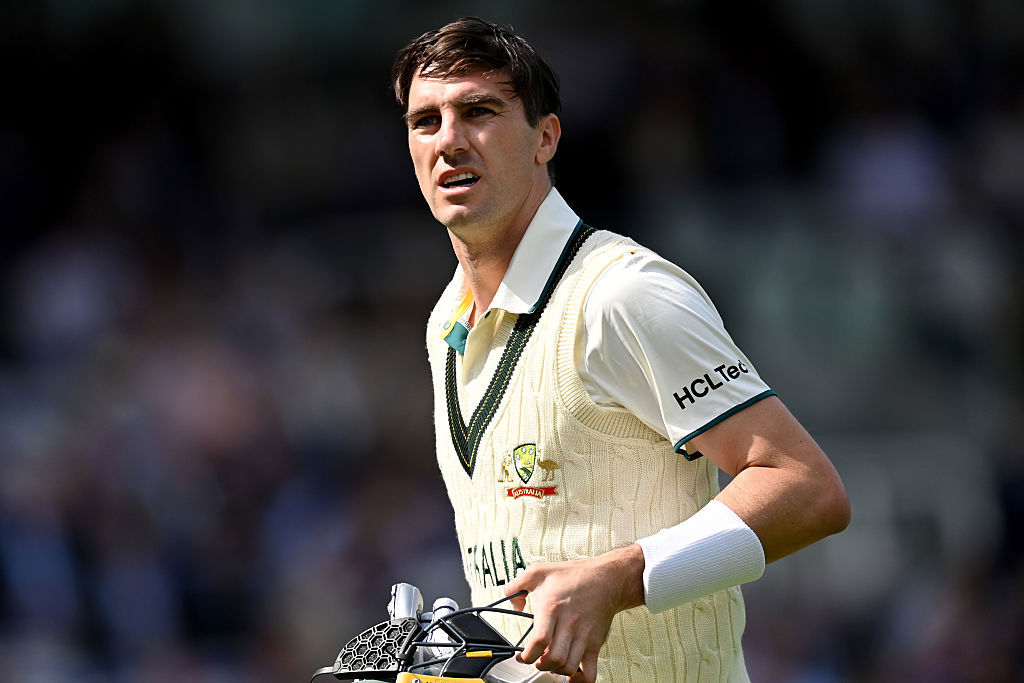 Australia captain Pat Cummins leaves the field.
