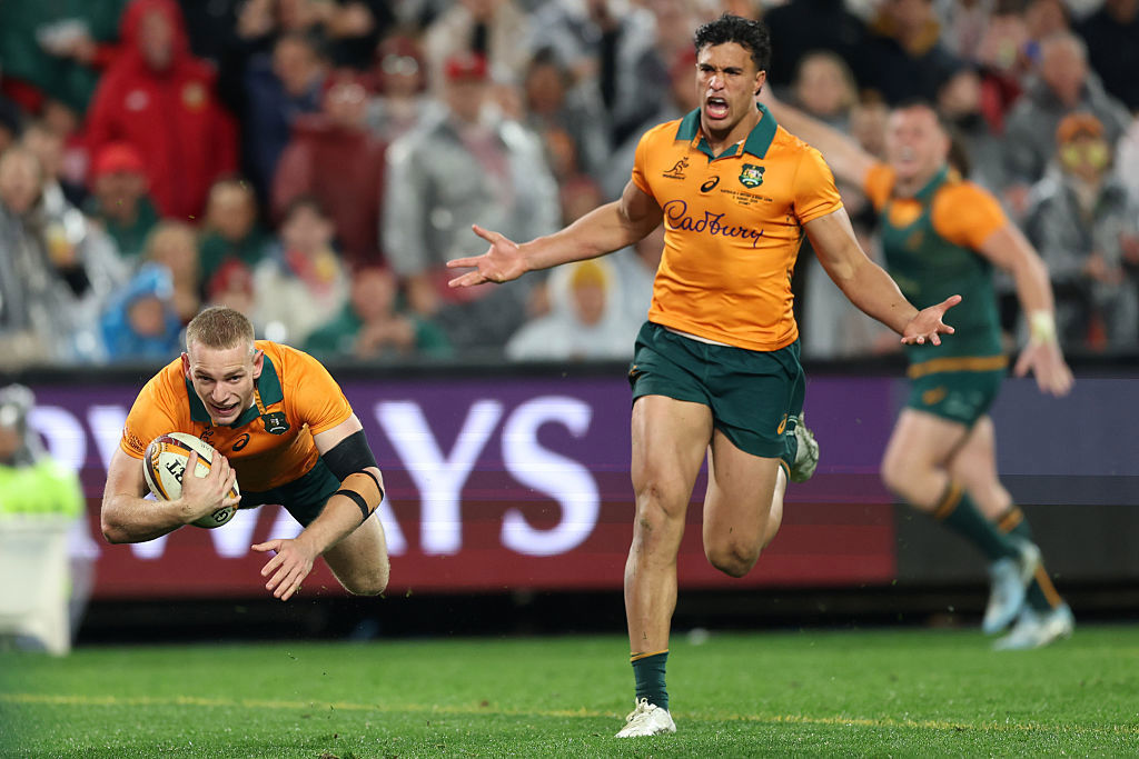 Max Jorgensen of the Wallabies dives over to score a try.