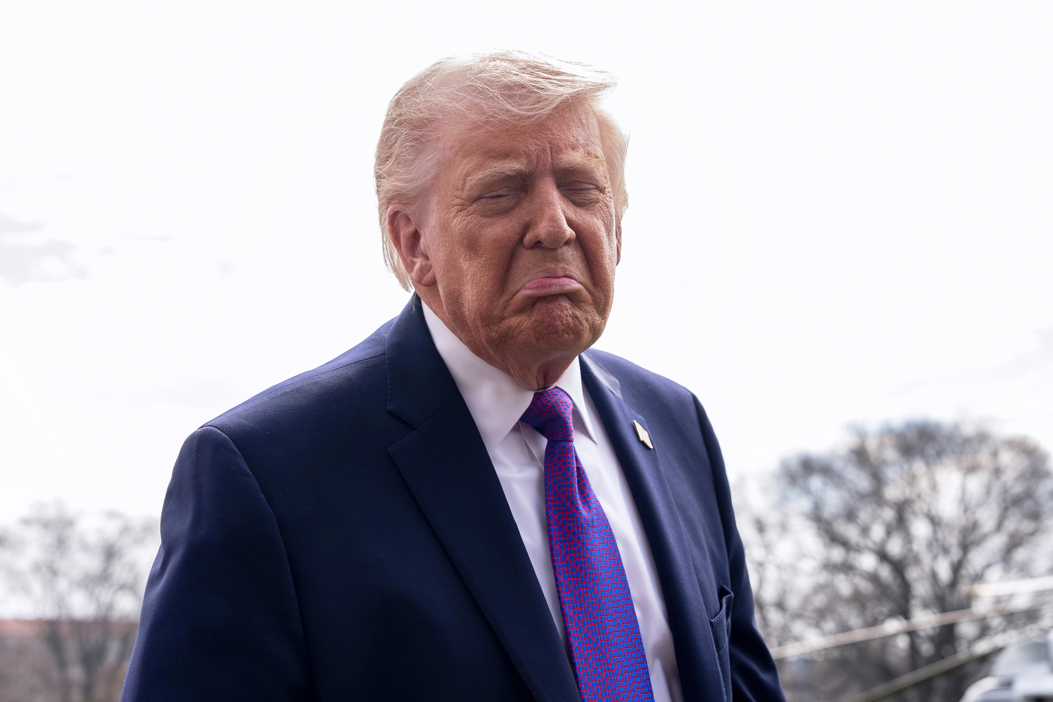 US President Donald Trump speaks with reporters