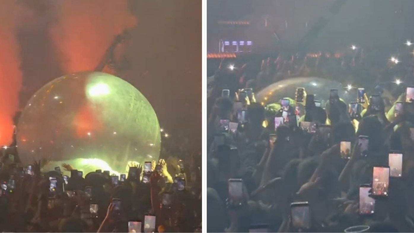 Akon's spectacular fail as he attempts to crowd surf in a giant bubble