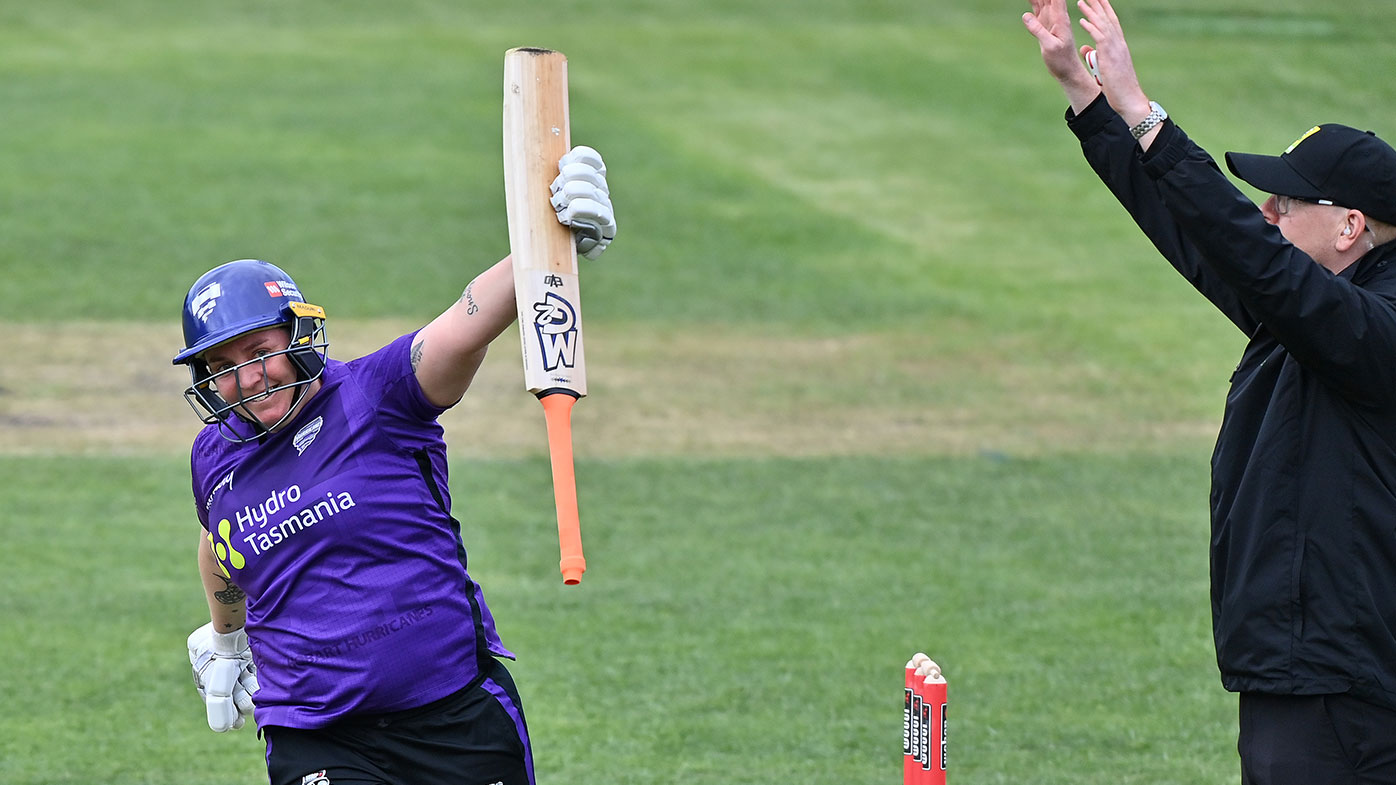  Rachel Priest of the Hurricanes celebrates scoring a century during the Women's Big Bash League