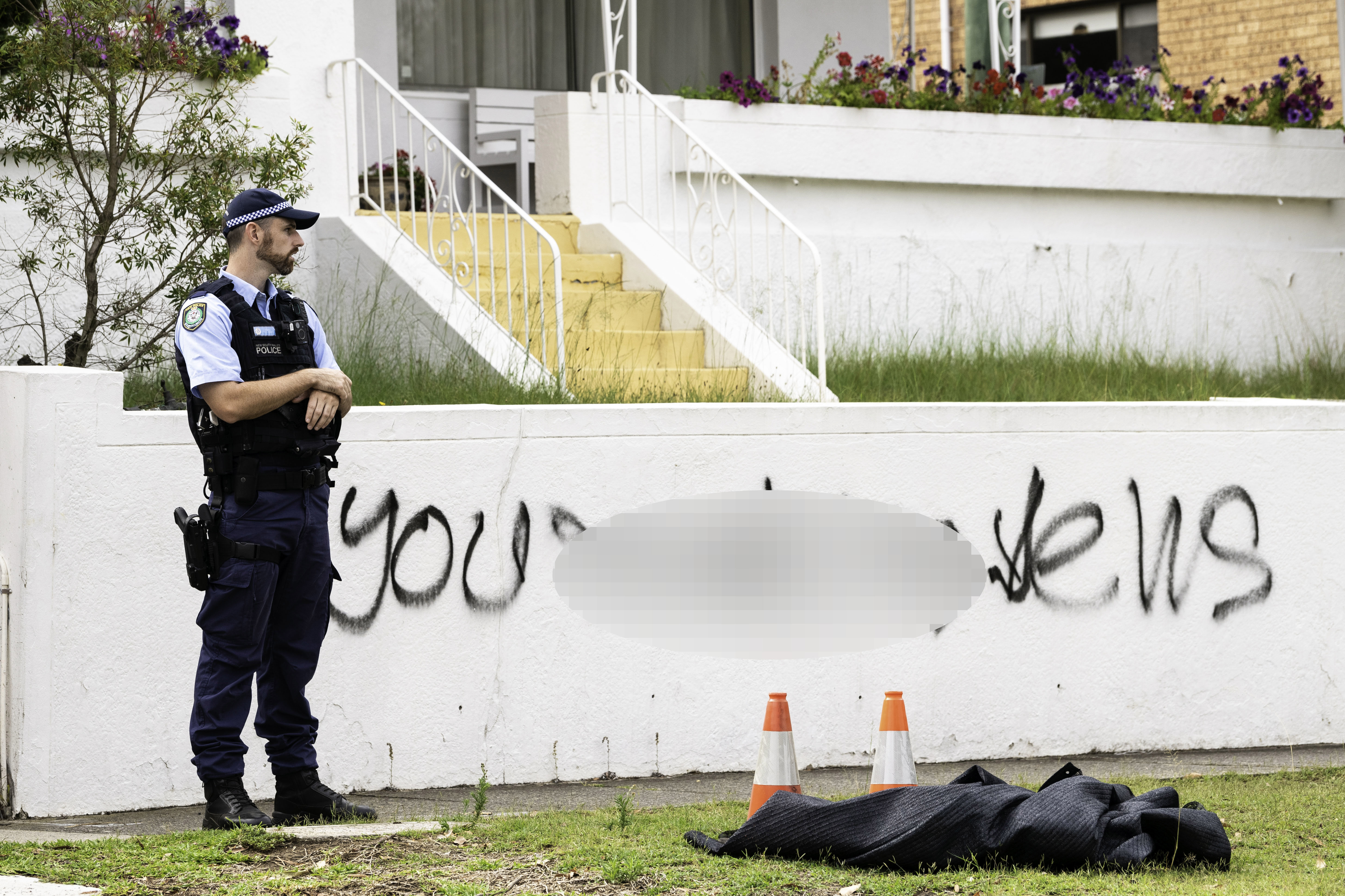 Man arrested over alleged antisemitic graffiti spree in Sydney