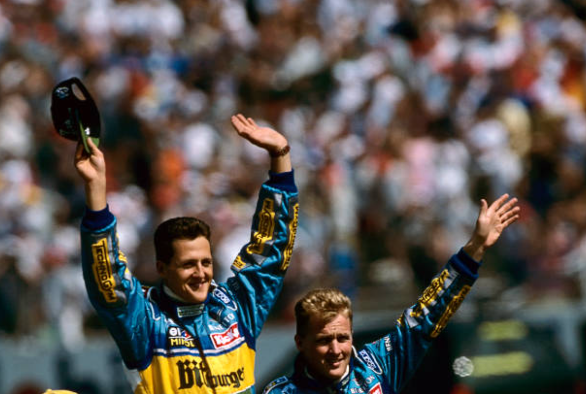 Michael Schumacher and Johnny Herbert.