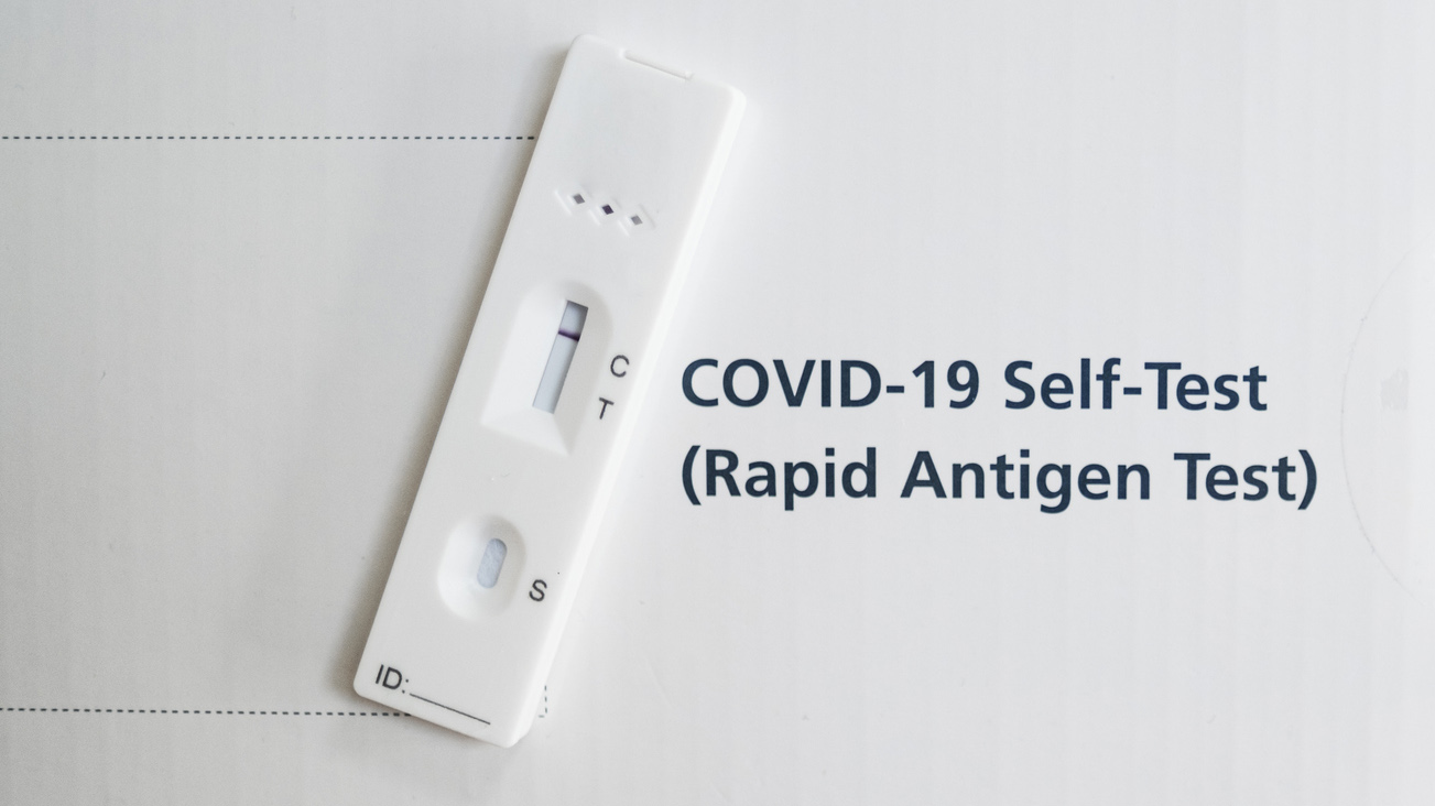 A rapid antigen test or lateral flow home testing kit.