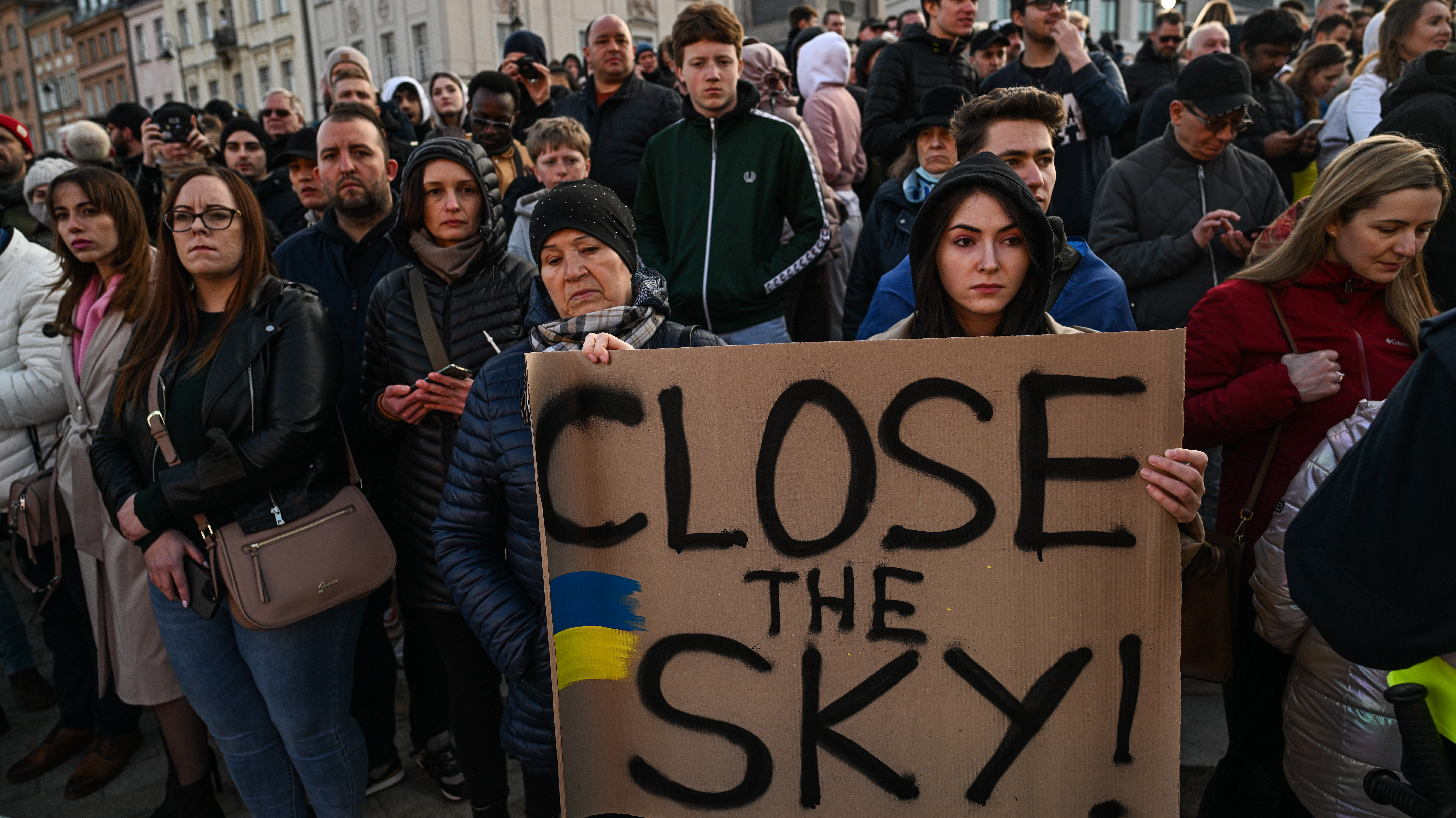 People wait ahead of The US President, Joe Biden delivering a speech at the Royal Castle in Warsaw, Poland. 