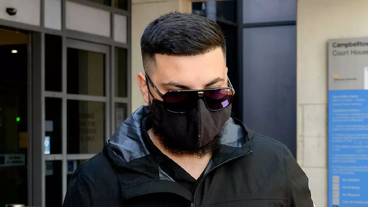 Adam Abdul-Hamid covered much of his face with a black mask and sunglasses.