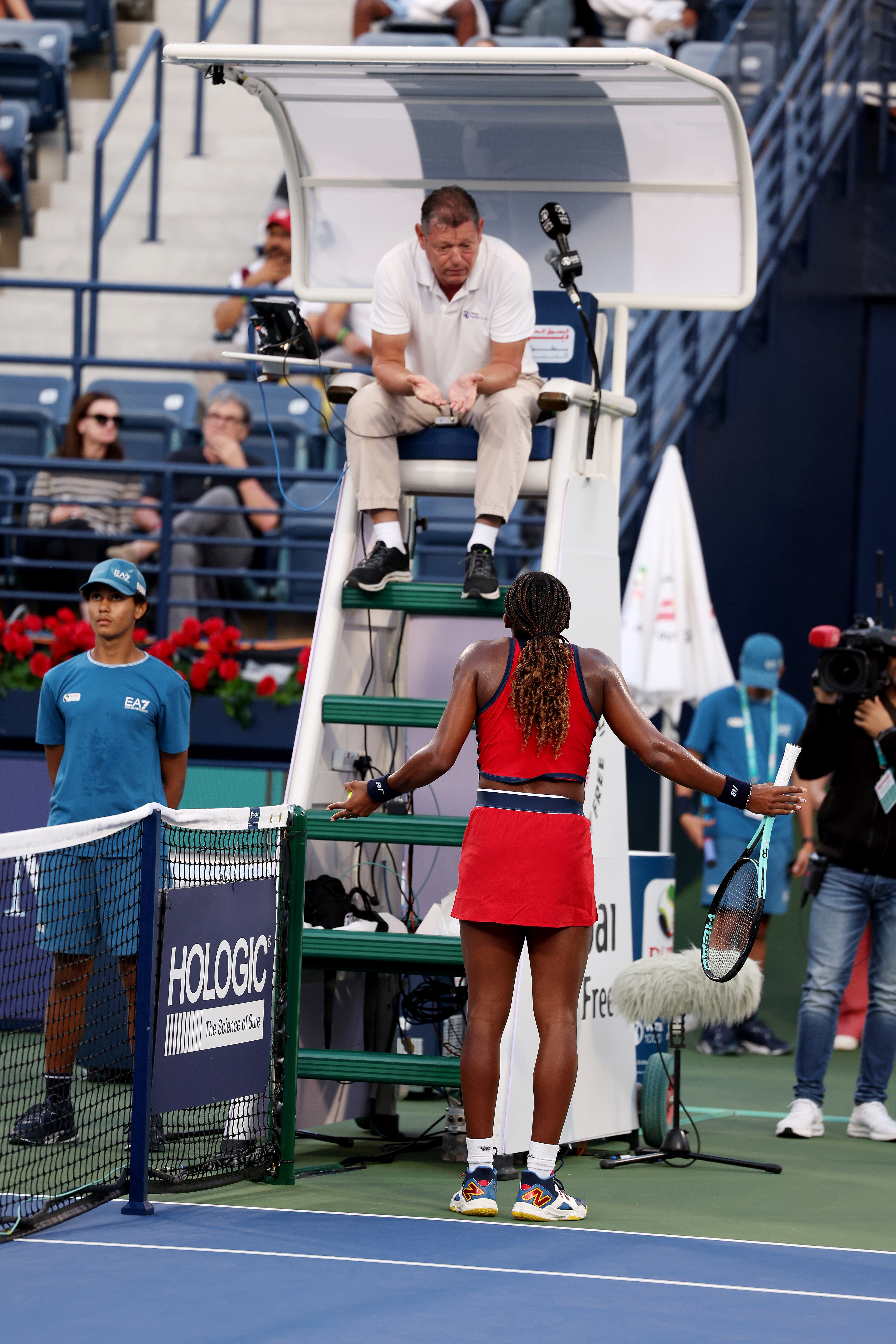 Coco Gauff challenges the umpire while playing Karolina Pliskova at the Dubai Tennis Championships.