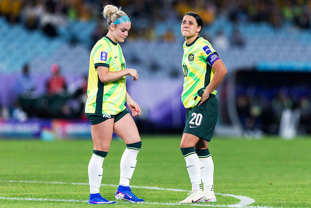 Sam Kerr reacts with teammate Ellie Carpenter.
