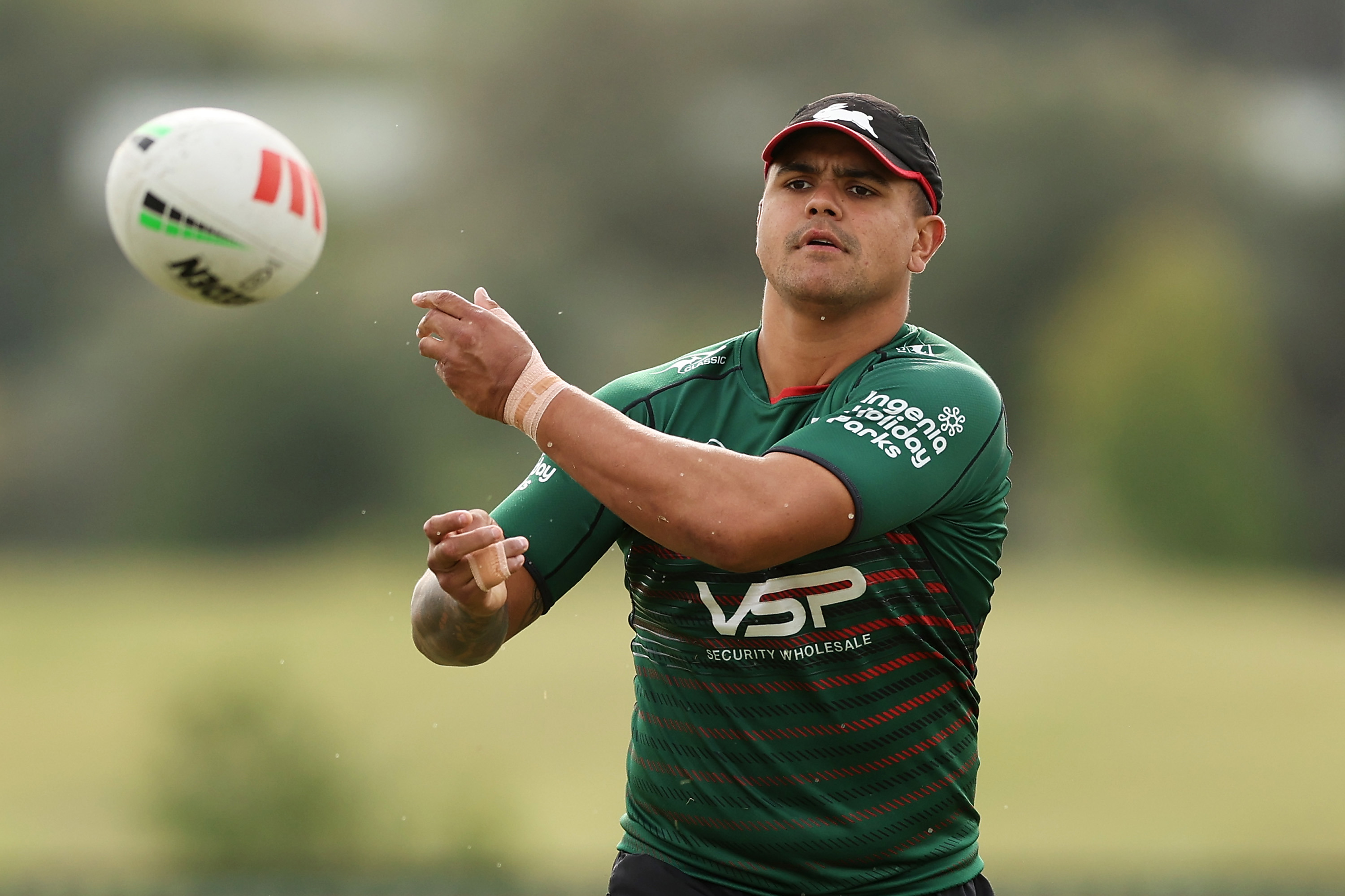 Latrell Mitchell of the Rabbitohs passes during a South Sydney Rabbitohs NRL training session at USANA Rabbitohs Centre on April 09, 2024 in Sydney, Australia. (Photo by Matt King/Getty Images)