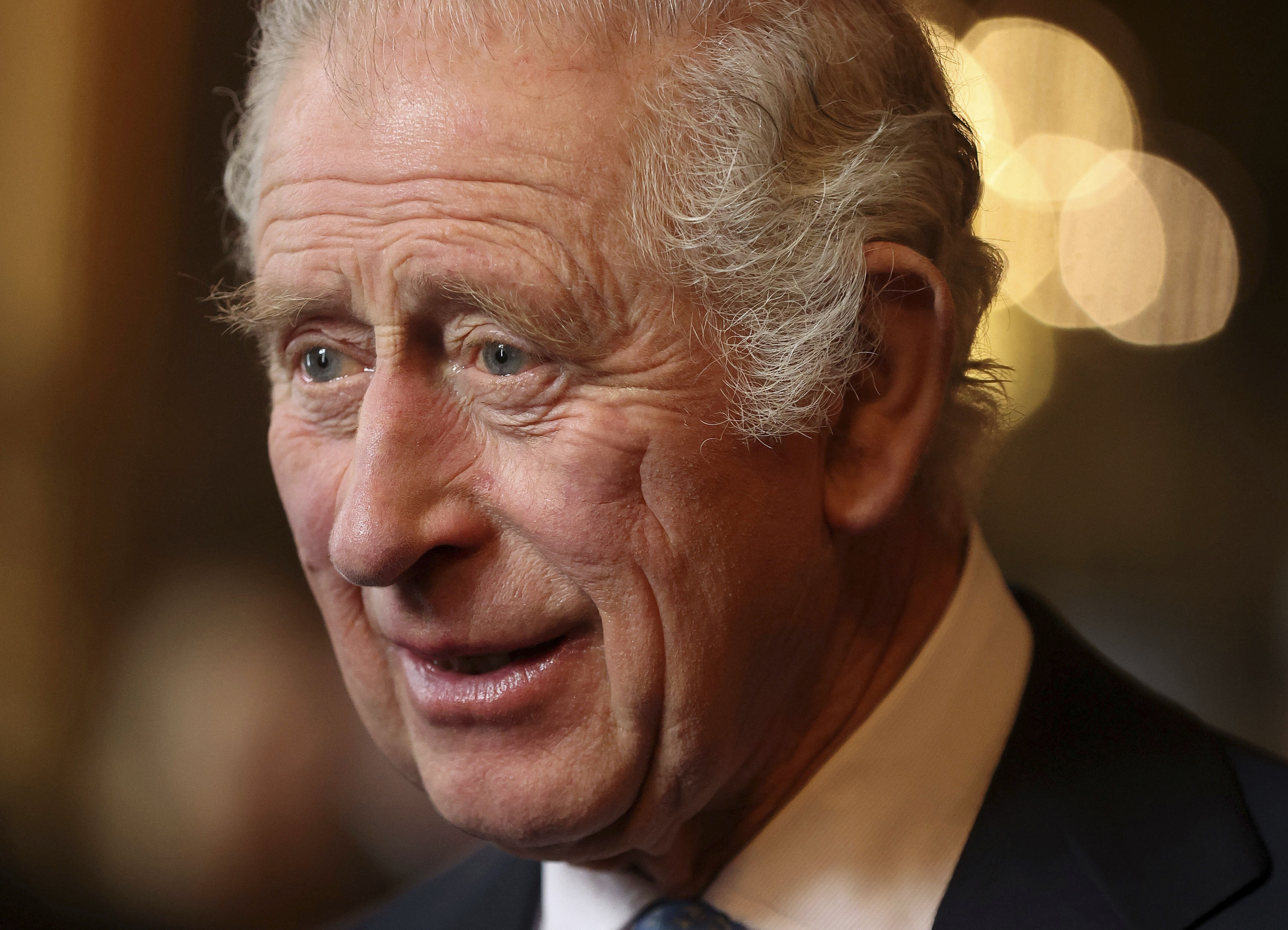 King Charles III speaks with guests during a reception and ceremony commemorating the 50th anniversary of the Resettlement of British Asians from Uganda in the UK, at Buckingham Palace in London, Wednesday Nov. 2, 2022 