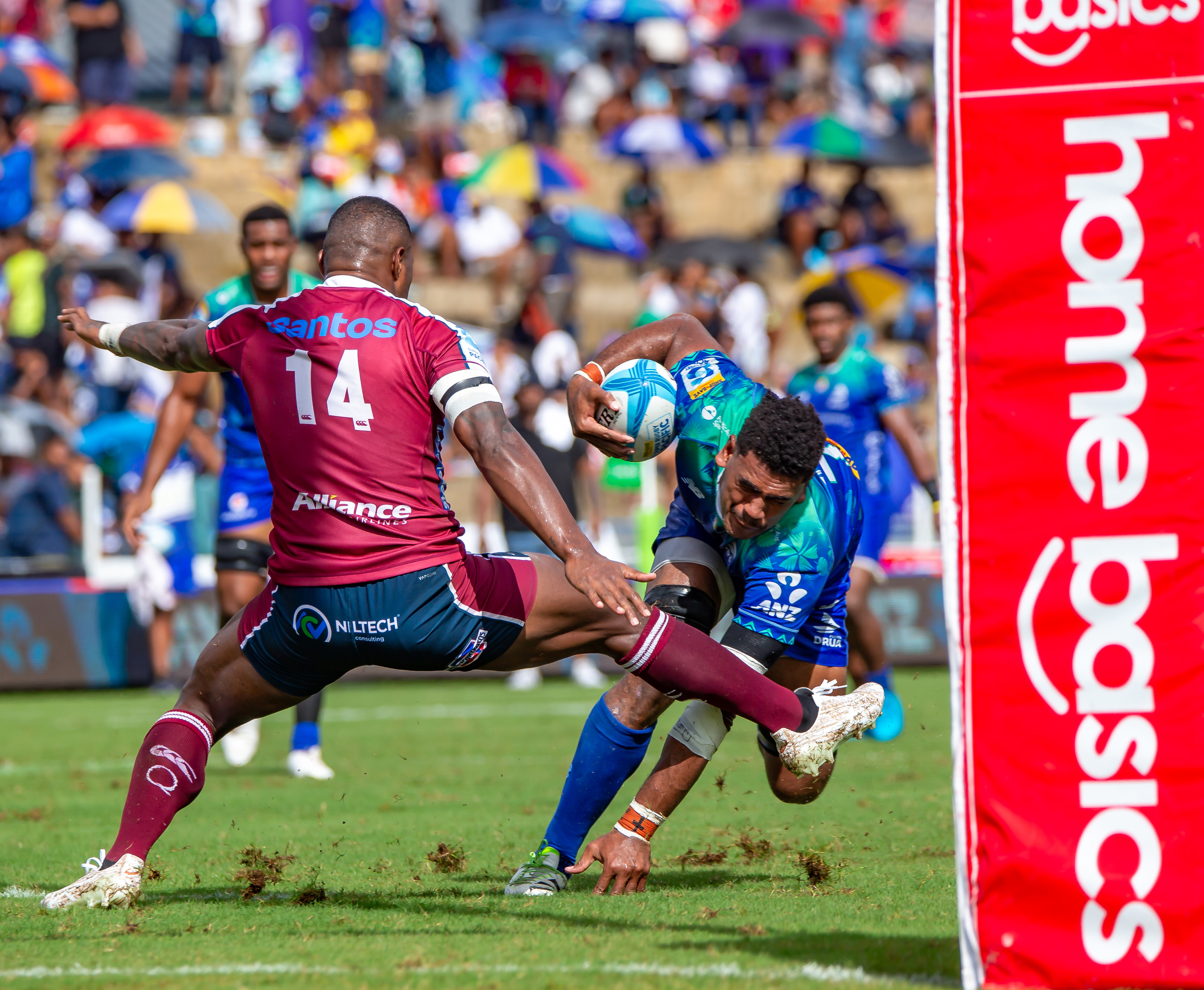 Suliasi Vunivalu trips Kitione Salawa at HFC Stadium.