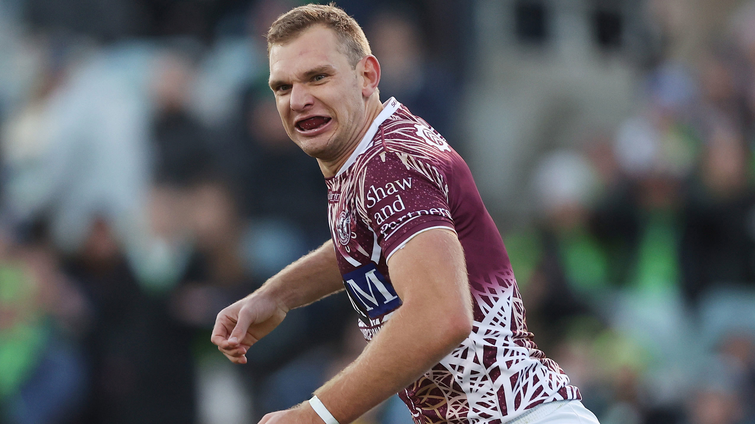 Tom Trbojevic celebrates after scoring a try in Manly's round 12 match against the Raiders.