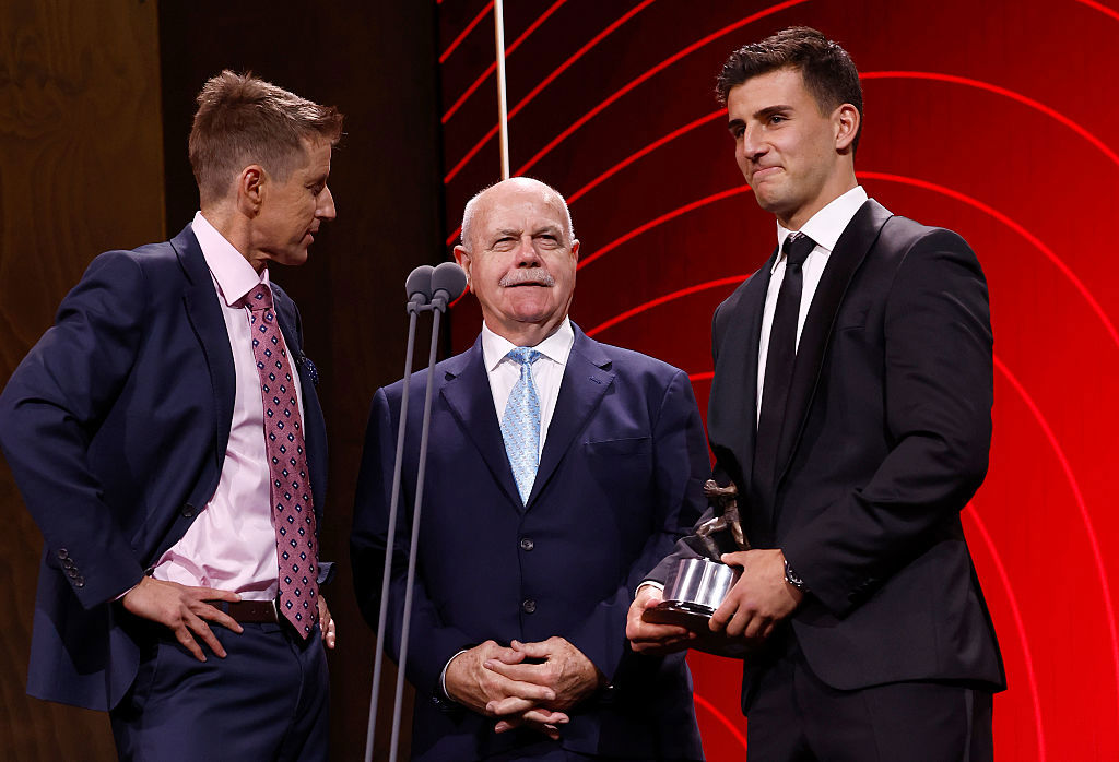 Mark Howard speaks with Nick Daicos of the Magpies alongside Leigh Matthews.