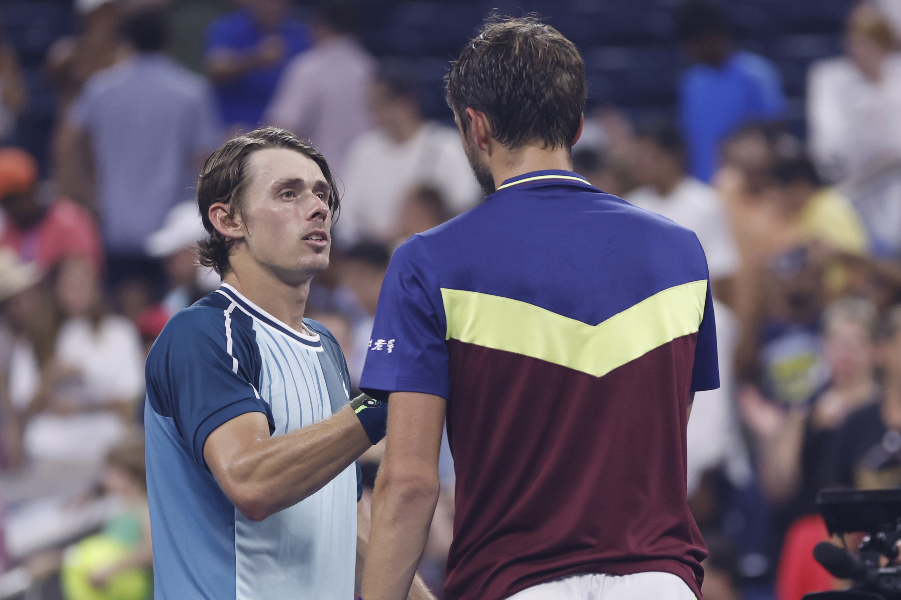 Daniil Medvedev and Alex De Minaur post match.