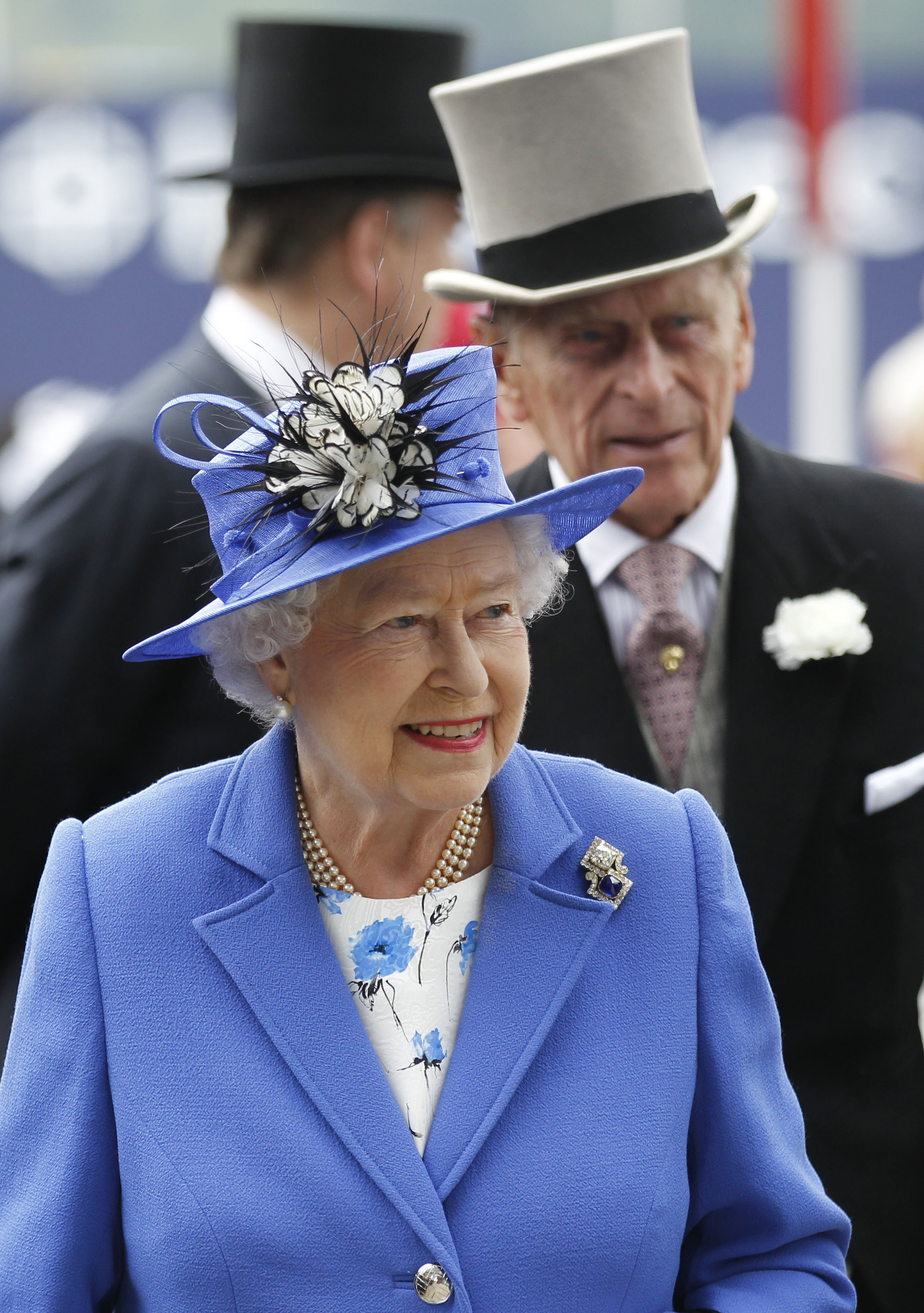 Queen Elizabeth and Prince Philip arrive for the Epsom Derby at Epsom race course, southern England at the start of four-day Diamond Jubilee celebrations to mark the 60th anniversary of the Queen's accession to the throne Saturday, June 2, 2012. 