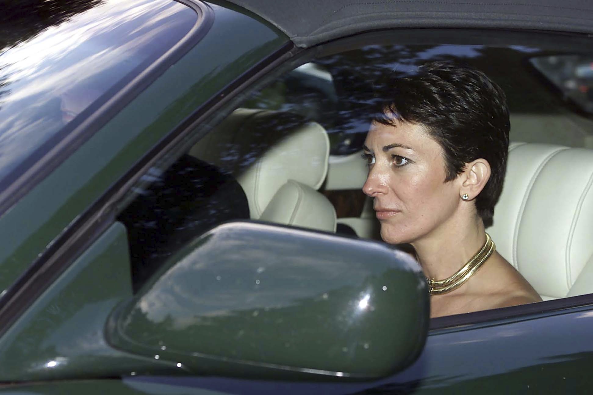 Ghislaine Maxwell being driven by Prince Andrew after attending a wedding of a mutural friend.