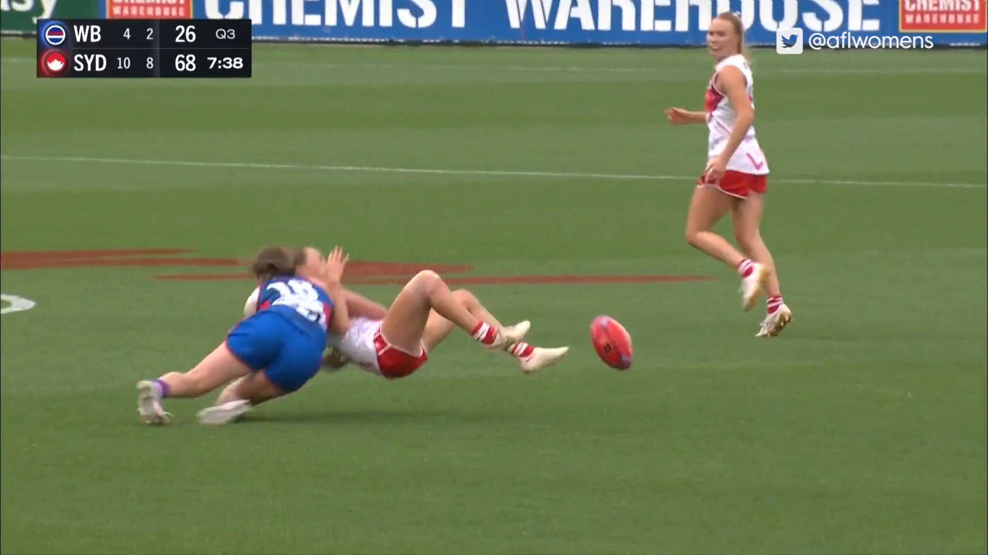 Britney Gutknecht lays a heavy tackle on Paige Sheppard.