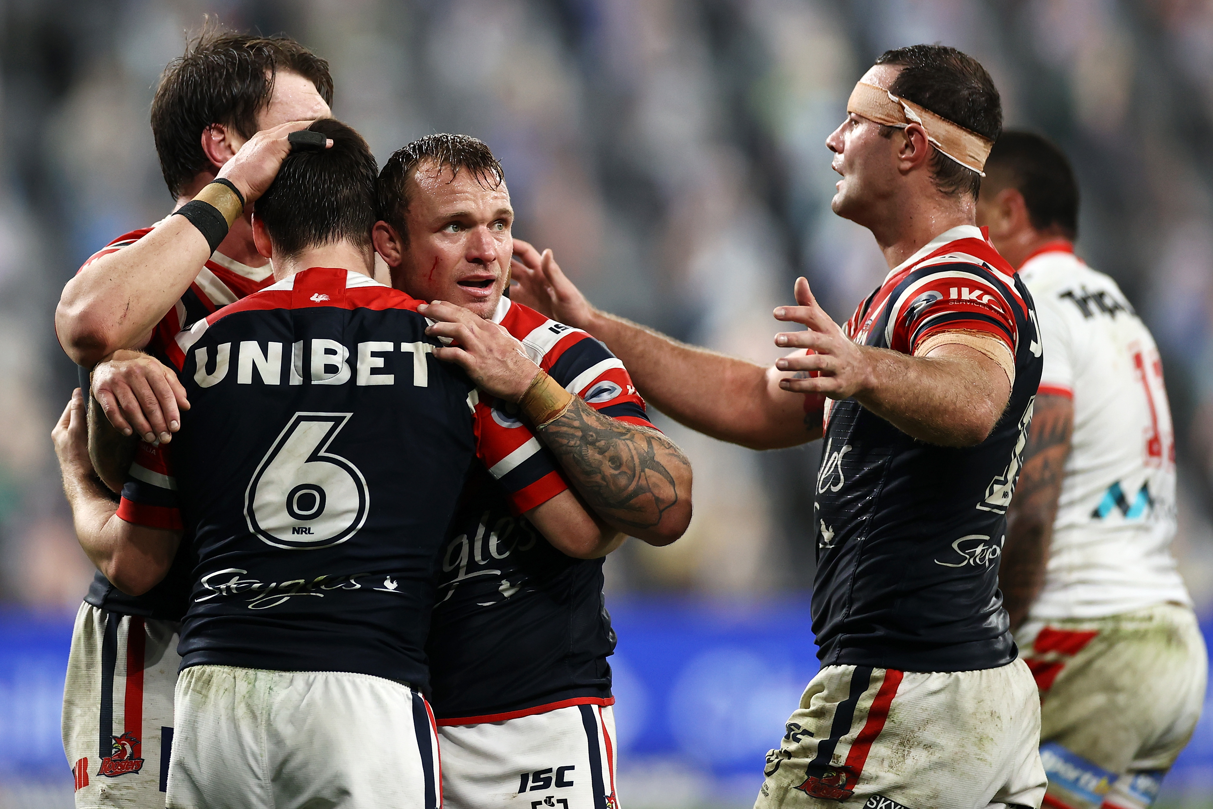 Angus Crichton, Jake Friend and Boyd Cordner congratulate Luke Keary after he scored agaisnt the Dragons in 2020. (Photo by Cameron Spencer/Getty Images)
