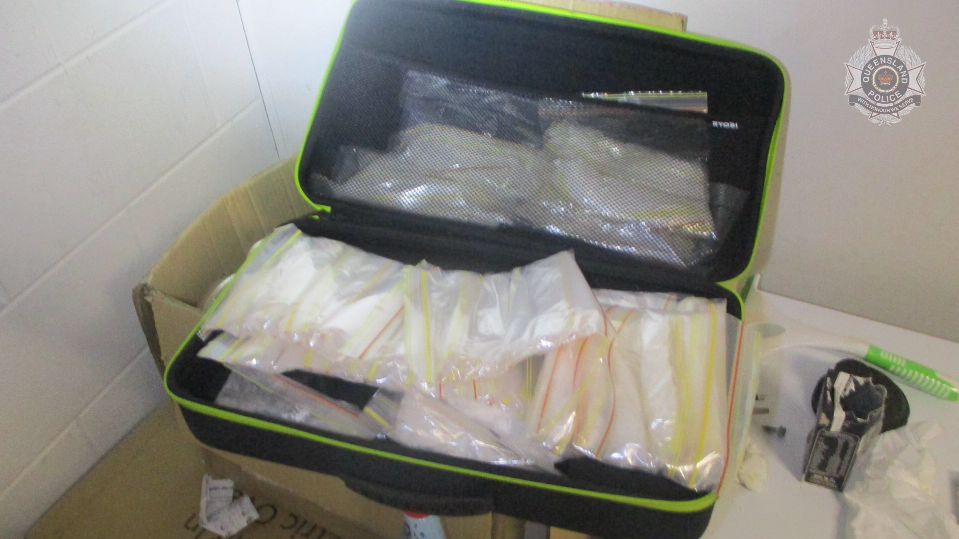 An alleged Lone Wolf bikie associate is one of two men charged over the kidnapping and extortion of a woman in Far North Queensland.