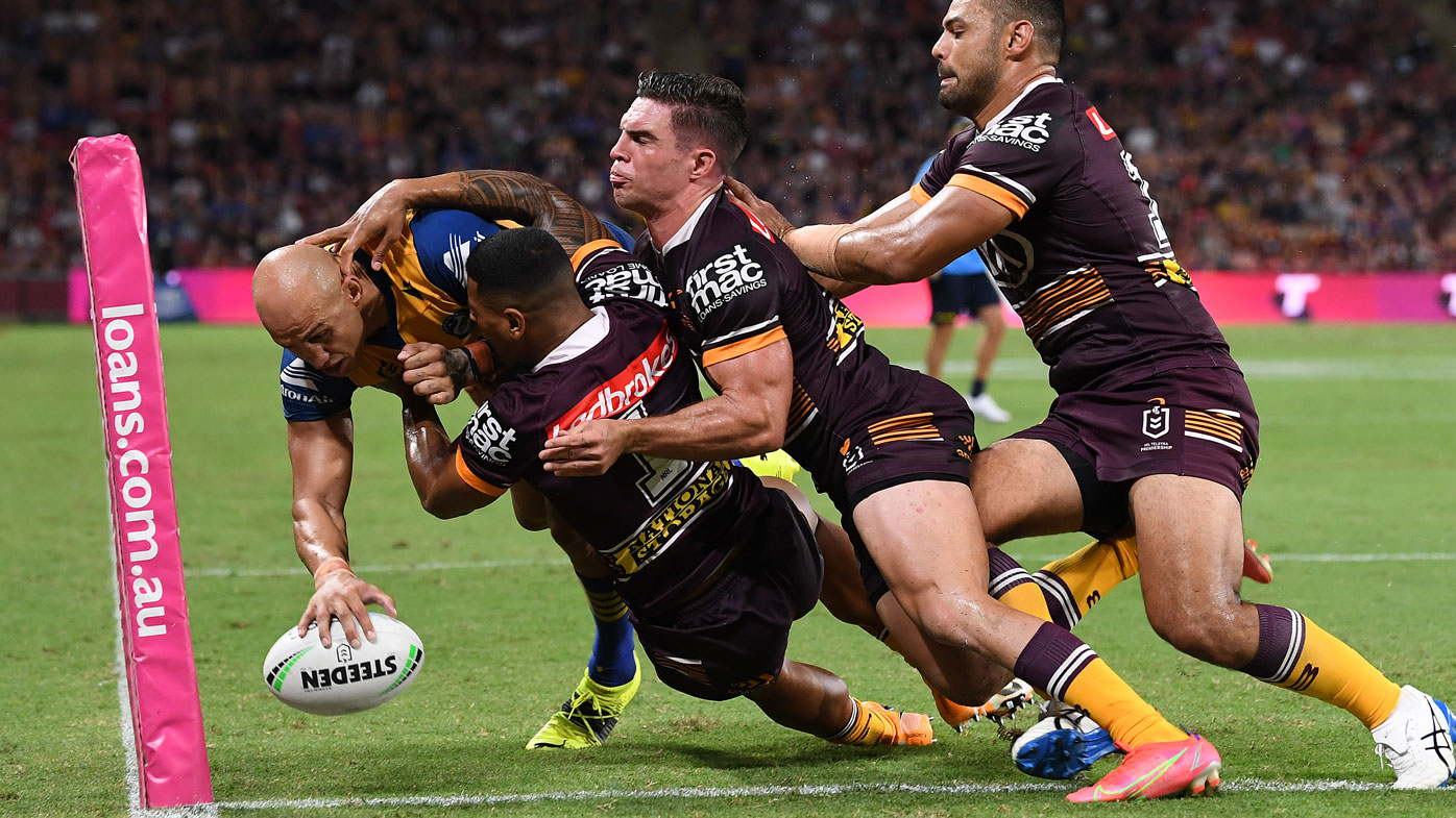 Blake Ferguson bullies his way across the line. (Getty)