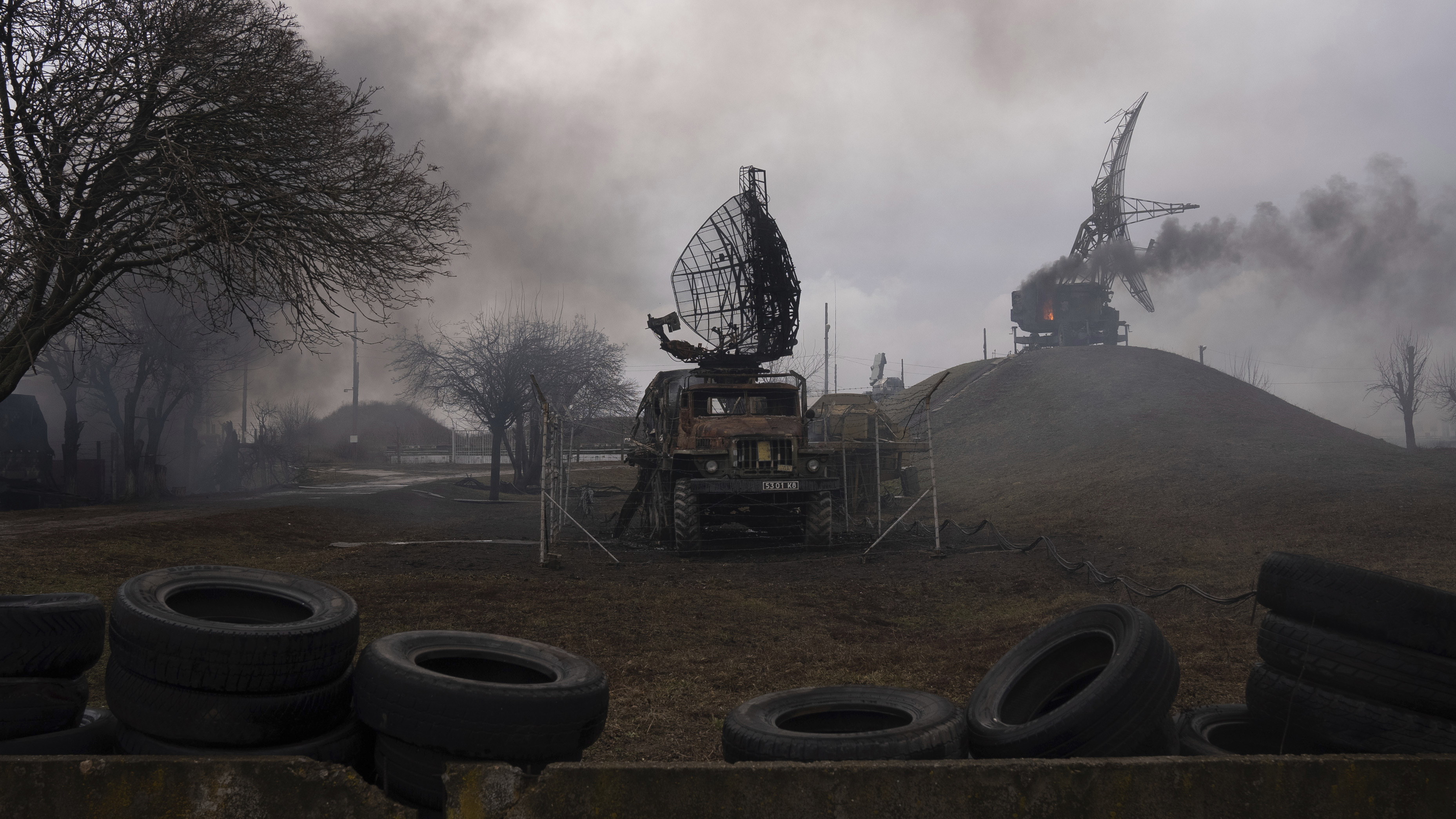 Smoke rise from an air defence base in the aftermath of an apparent Russian strike in Mariupol, Ukraine.