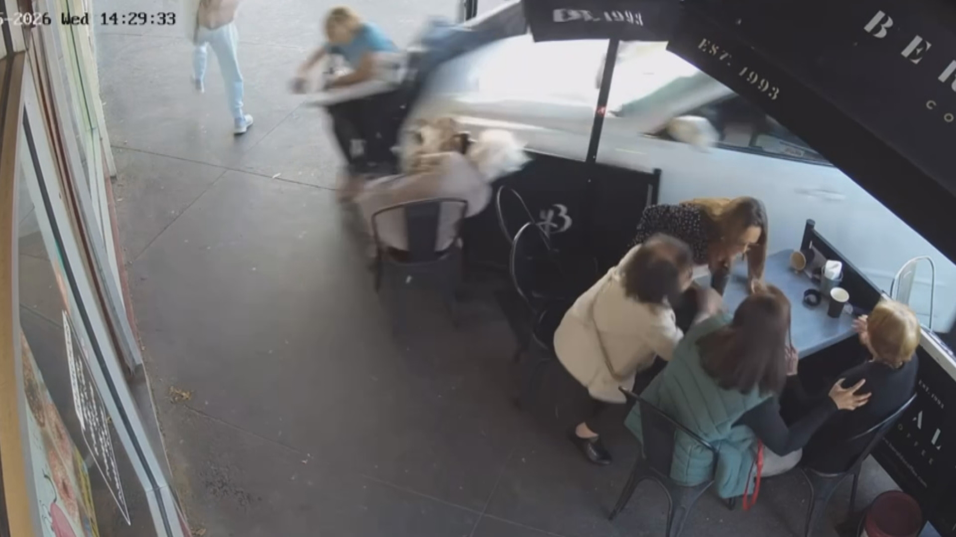 'Terrifying': Two injured after car ploughs into patrons at Melbourne cafe