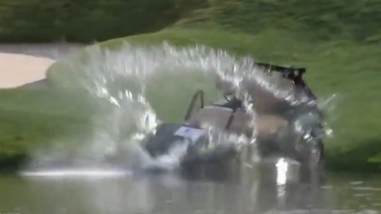 A runaway golf cart crashed into a pond during the first round of the Travelers Championship in the US.