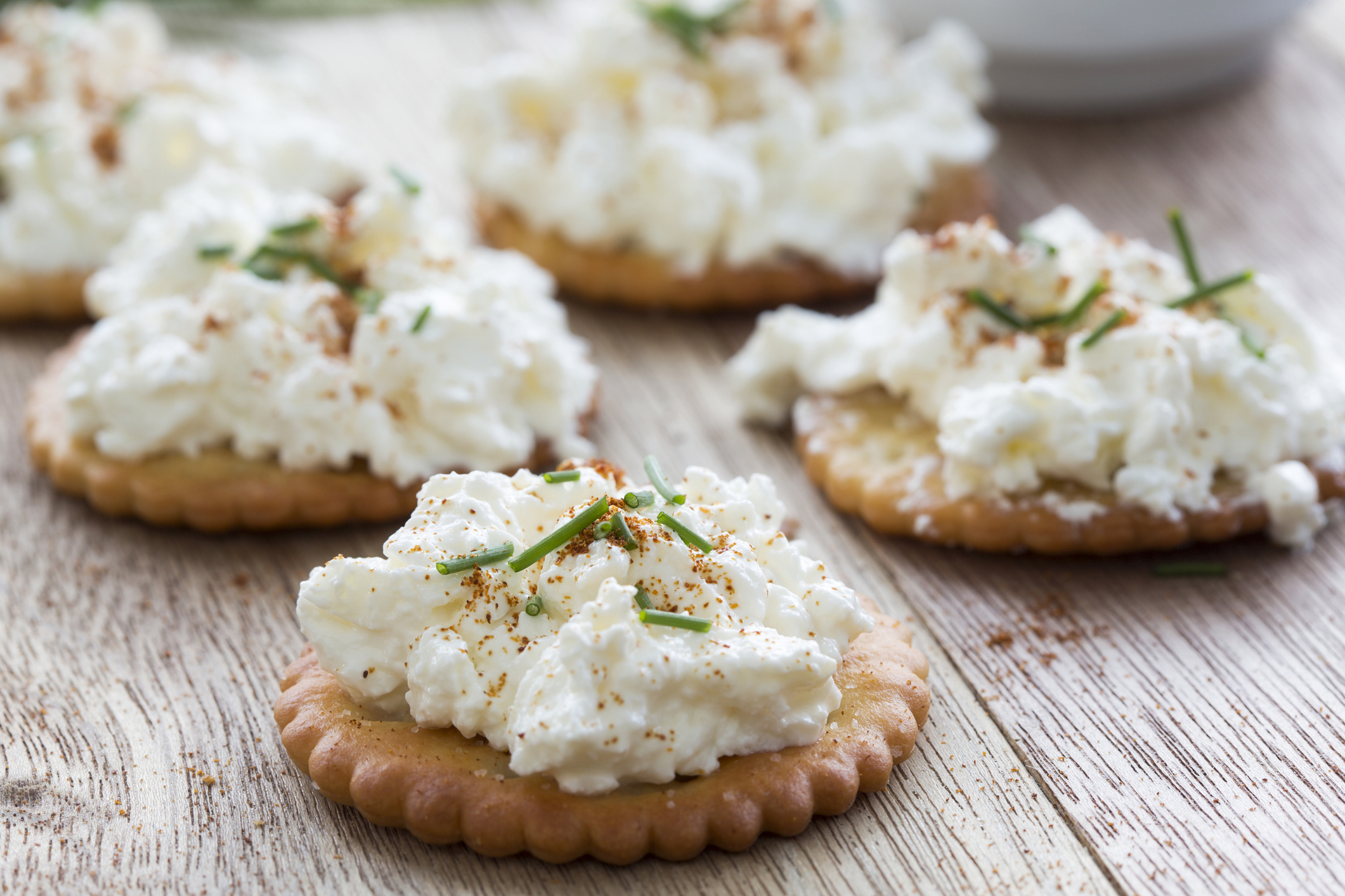 "Salticrax, South African cracker topped with cottage cheese with a sprinkling of cayenne pepper"