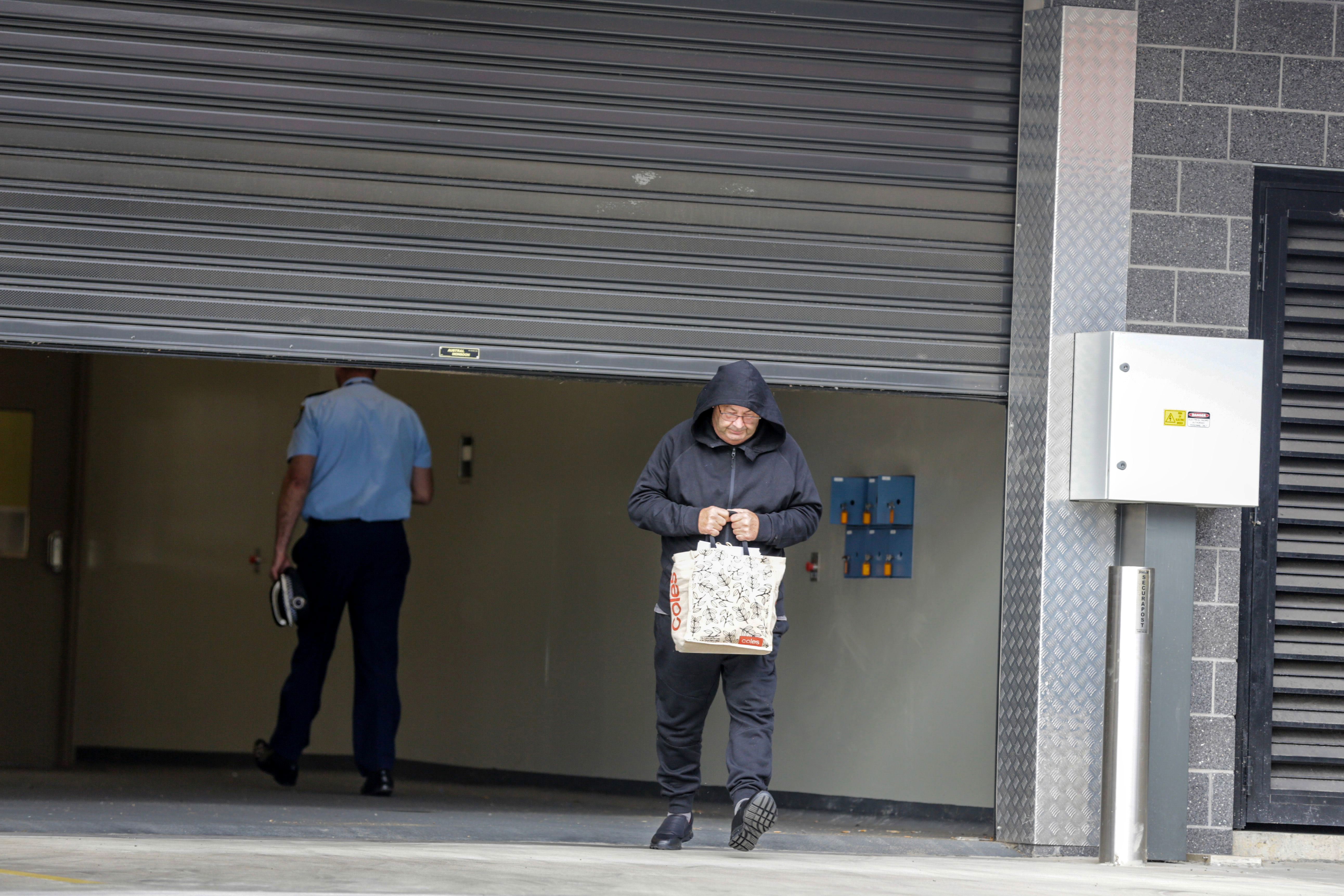 Brett Andrew Button, 58, the bus driver from the Hunter Valley crash where 10 people died, leaves Cessnock Police Station