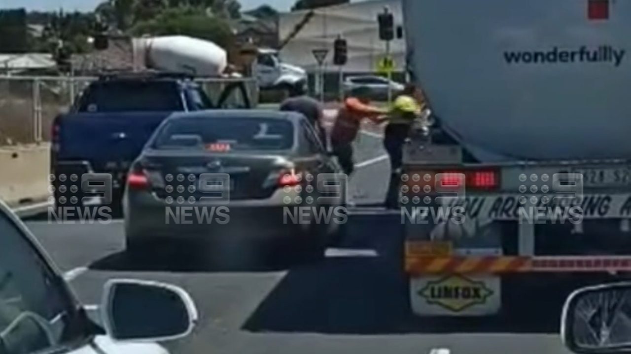 Two men caught fighting on West Gate Bridge in Melbourne.