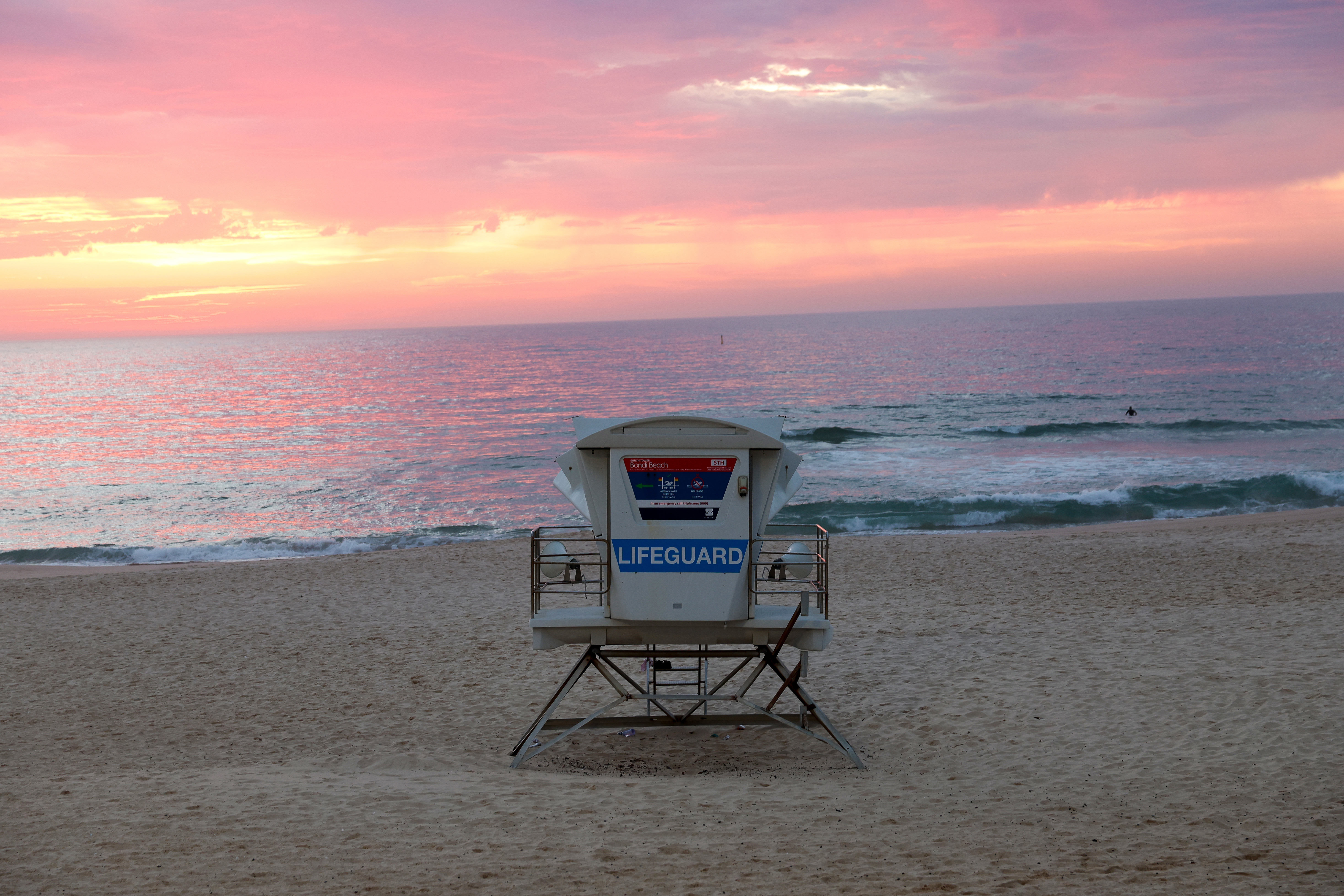 SYDNEY, AUSTRALIA - DECEMBER 21: A general view of Bondi Beach at dawn as early light breaks on December 21, 2025 in Sydney, Australia. Life slowly returned to normal at Bondi Beach, with people from all walks of life still paying respects and tributes as raw grief and funerals gave way to quiet commemorations. Police say at least 16 people, including one suspected gunman, were killed and more than 40 others injured when two attackers opened fire near a Hanukkah celebration at the world-famous B