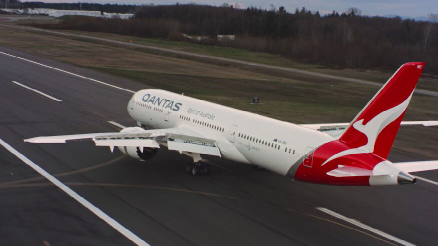 Flight QF93 to Los Angeles sat on the tarmac at Melbourne Airport on Monday night before it was cancelled.