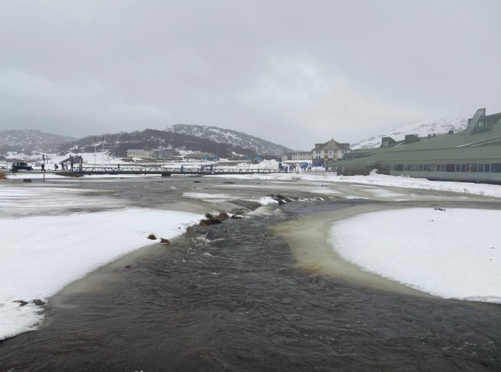 Perisher Creek burst its banks as heavy rain lashed the NSW alps.