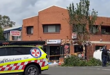 Three men are fighting for their lives after they were hit by a car that crashed and mounted the curb outside an Indian restaurant in Sydney's west.