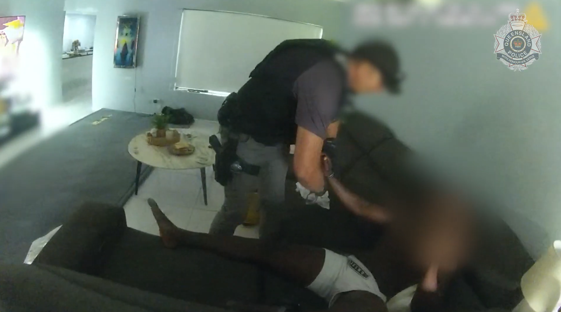 An alleged Lone Wolf bikie associate is one of two men charged over the kidnapping and extortion of a woman in Far North Queensland.