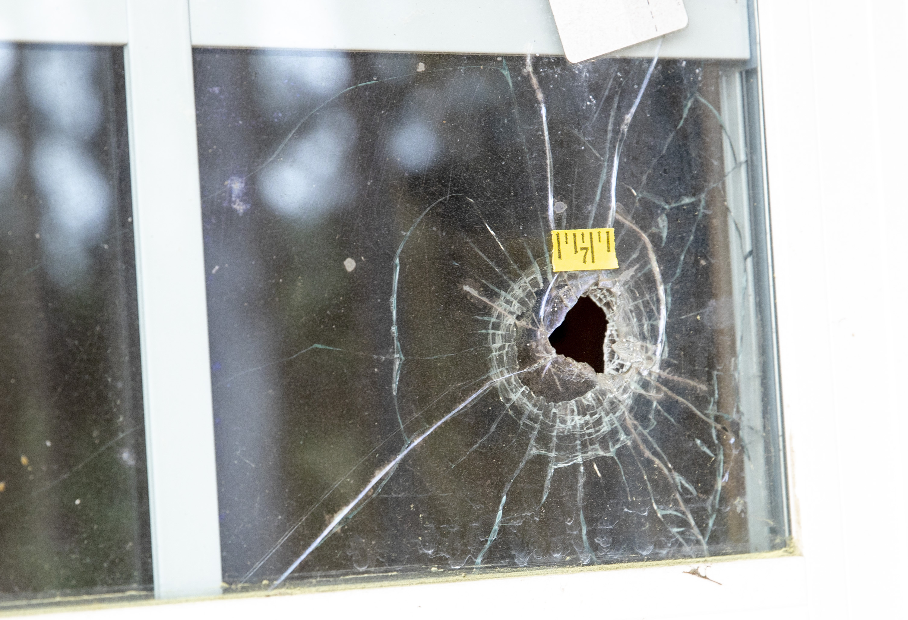 Bullet holes are seen in the glass at the Murdaugh Moselle property on Wednesday, March 1, 2023.  