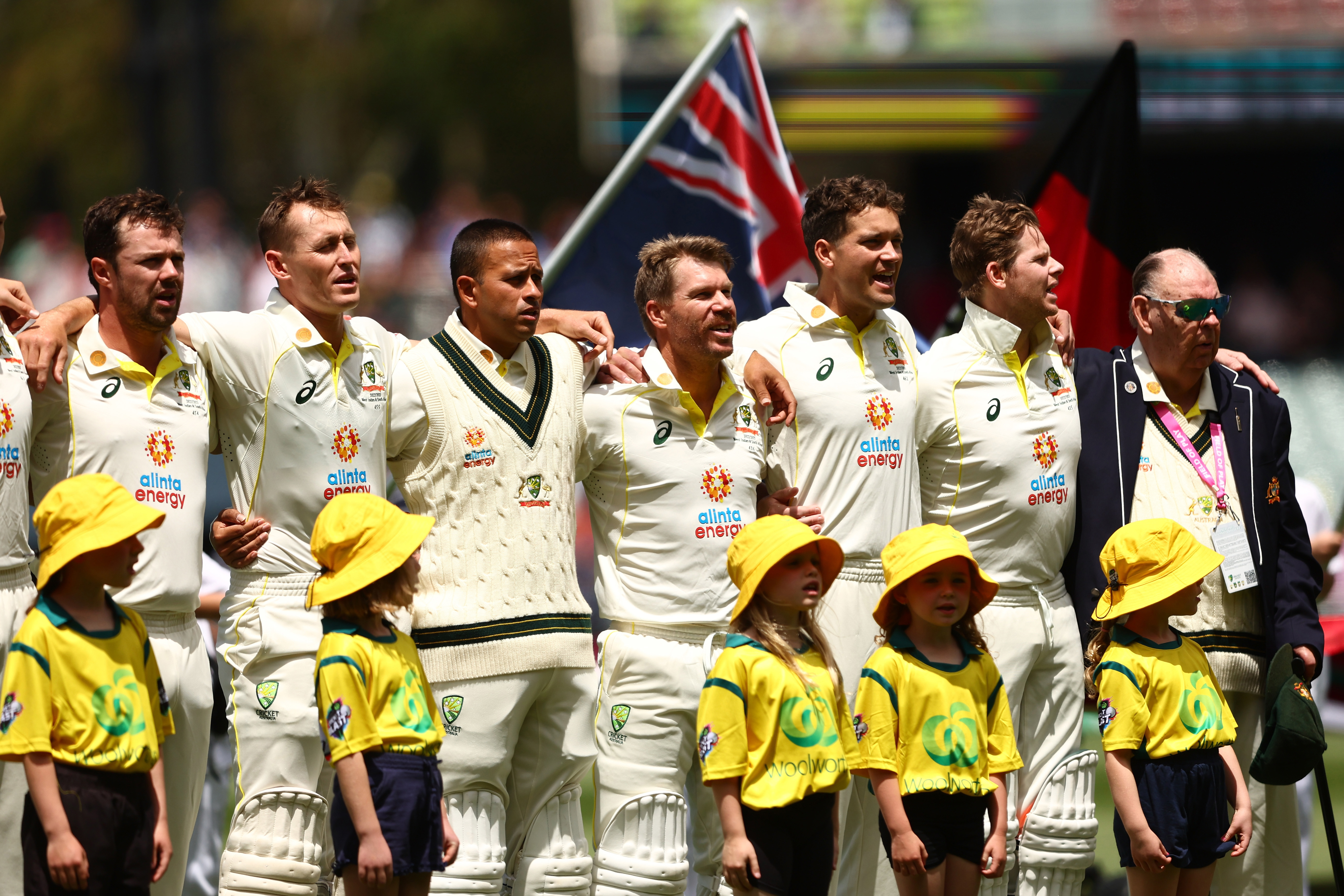 Australian players stand for the national anthem during day one of the Second Test Match in the series between Australia and the West Indies at Adelaide Oval on December 08, 2022 in Adelaide, Australia. (Photo by Chris Hyde/Getty Images)