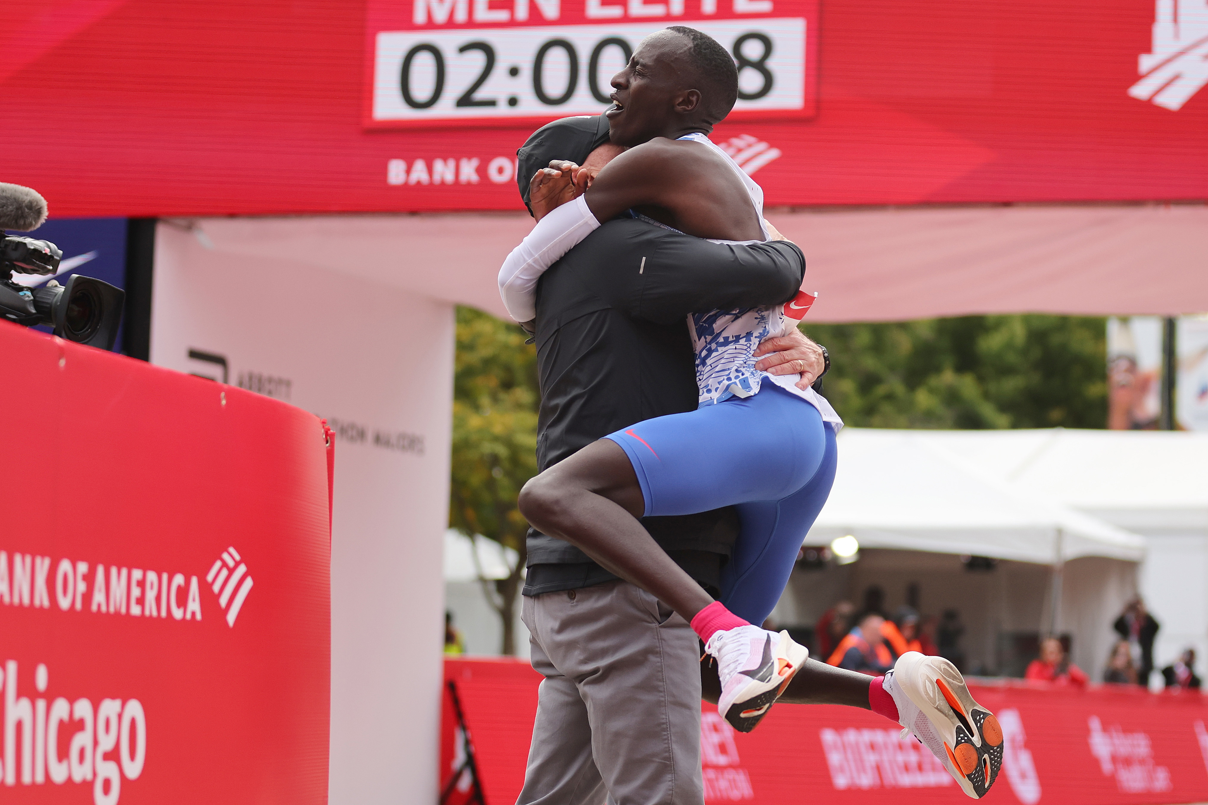 An ecstatic Kelvin Kiptum after his world record-breaking run in the 2023 Chicago Marathon.