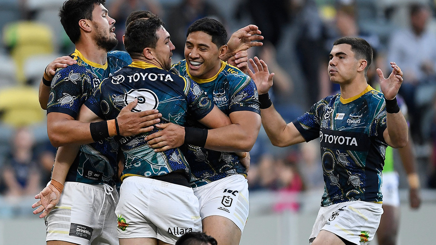 Reece Robson scores for North Queensland.