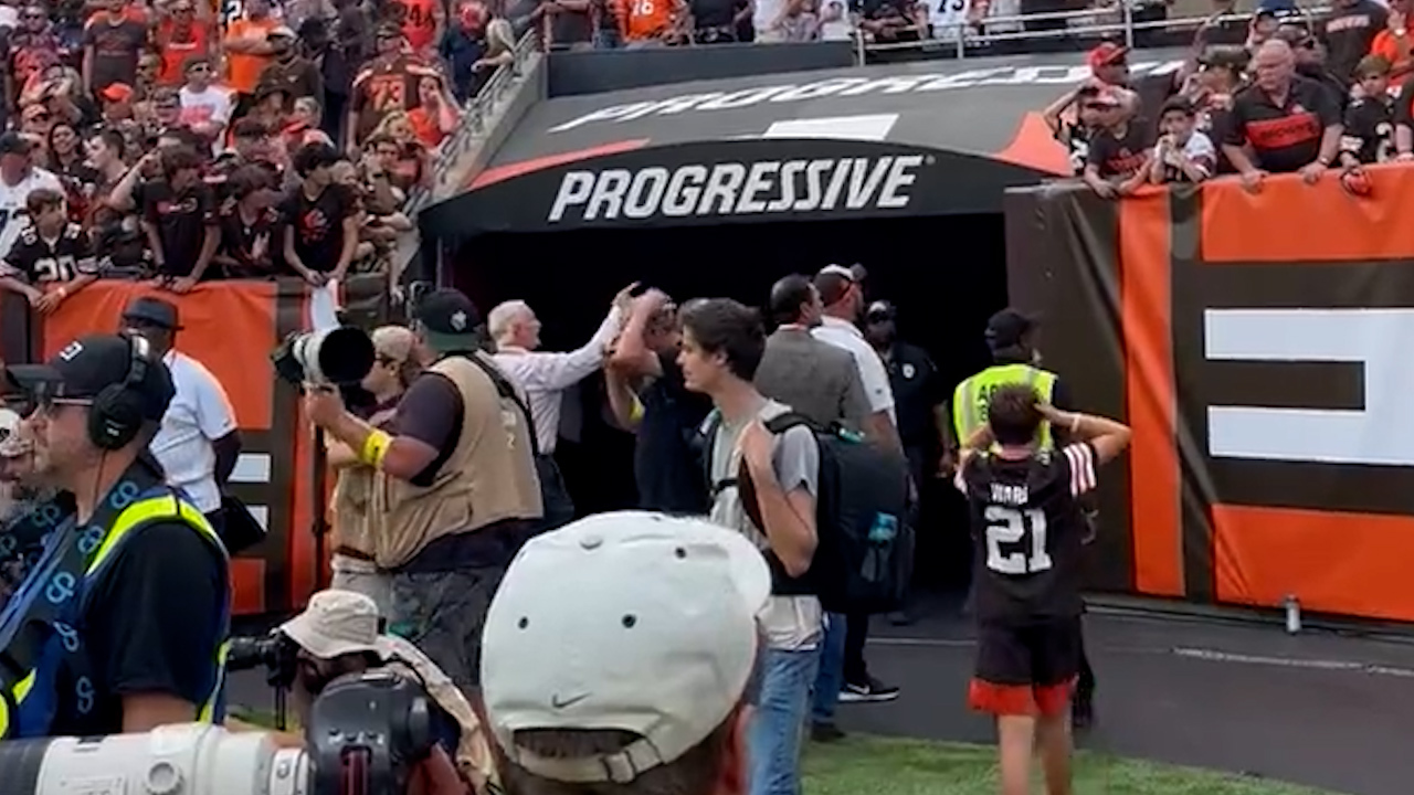 Haslam stopped and pointed in the direction that the bottle came from.