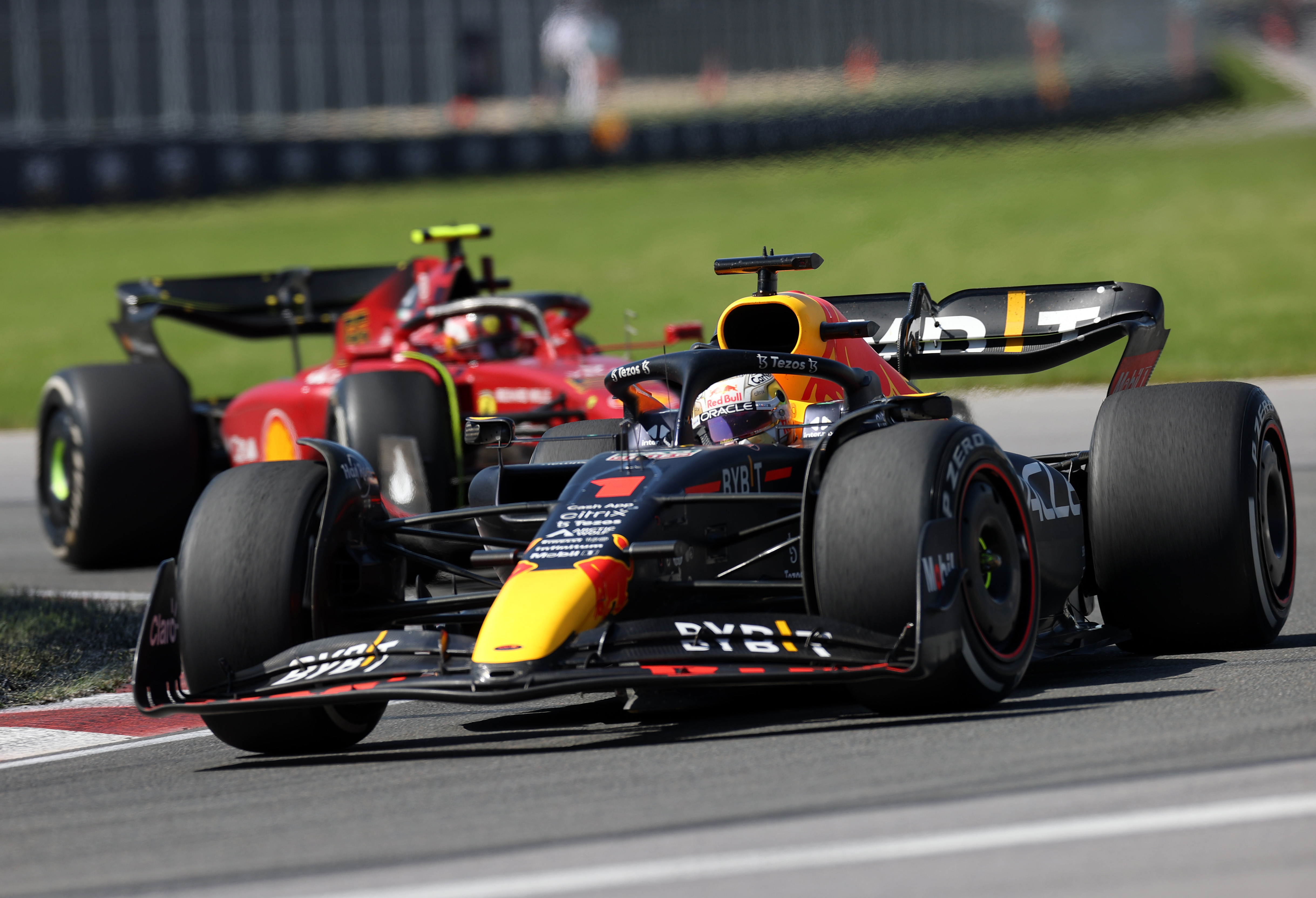 Max Verstappen leads Carlos Sainz.