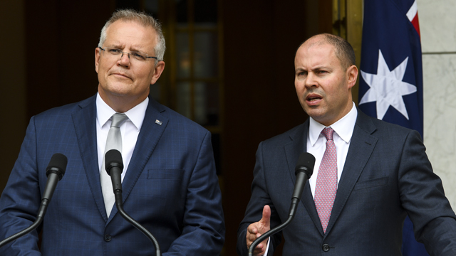 Australian Prime Minister Scott Morrison and Federal Treasurer Josh Frydenberg speak about the government's bushfire response at Parliament House in Canberra.