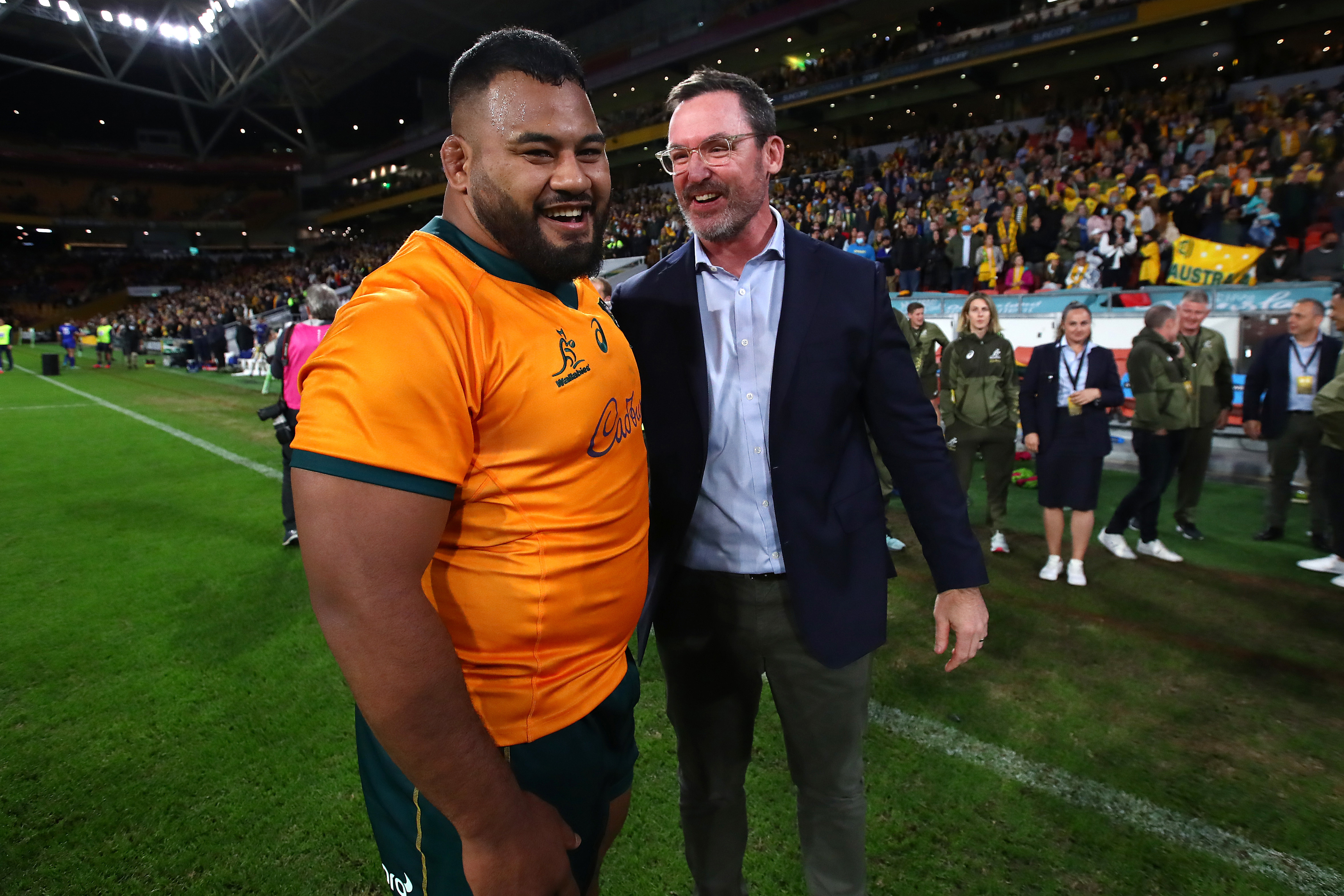 Taniela Tupou and assistant coach Dan McKellar of the Wallabies celebrate in 2021.