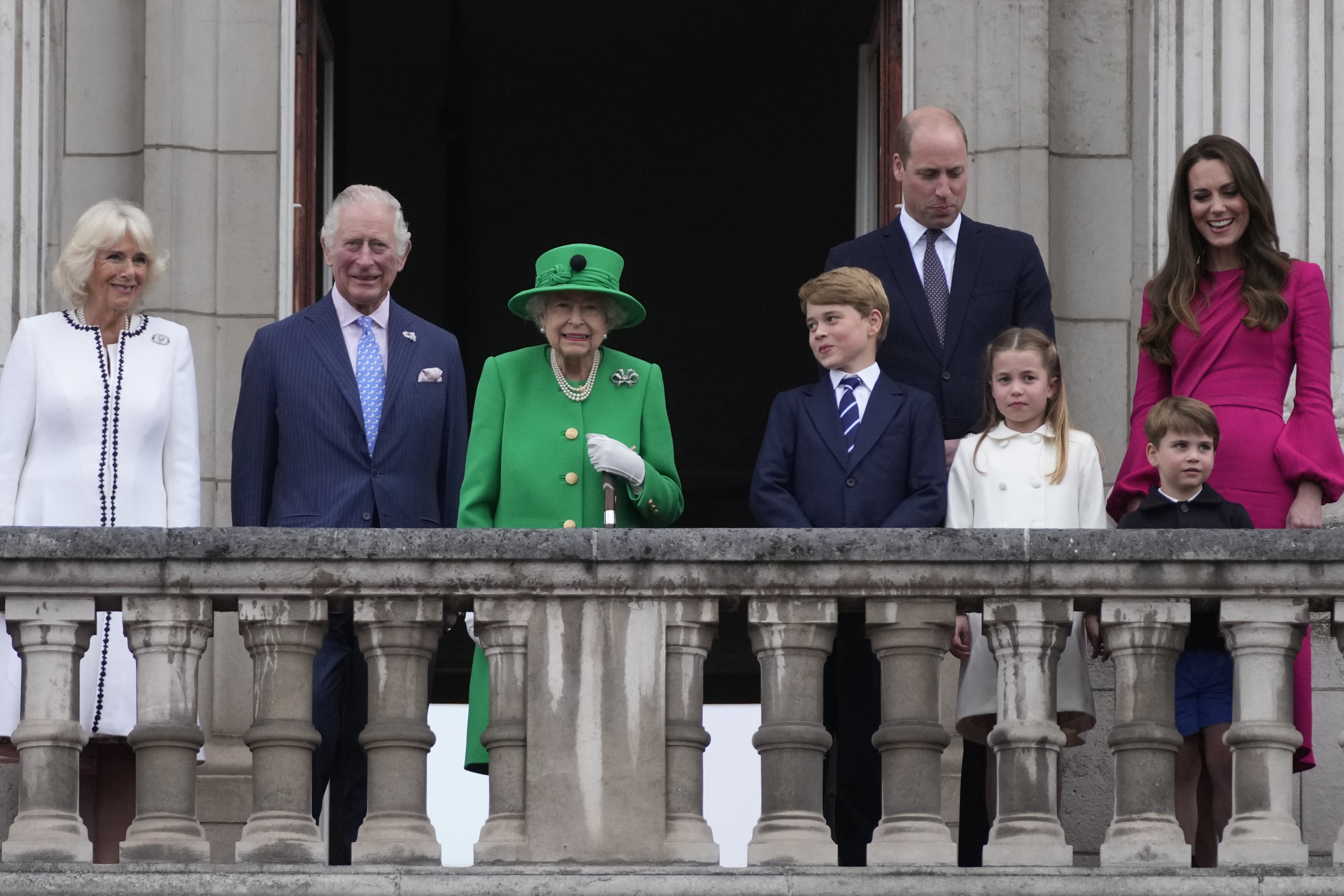 Queen Elizabeth II stands on the balcony with the Royal family during the Platinum Jubilee Pageant outside Buckingham Palace in London, Sunday, June 5, 2022, on the last of four days of celebrations to mark the Platinum Jubilee.  