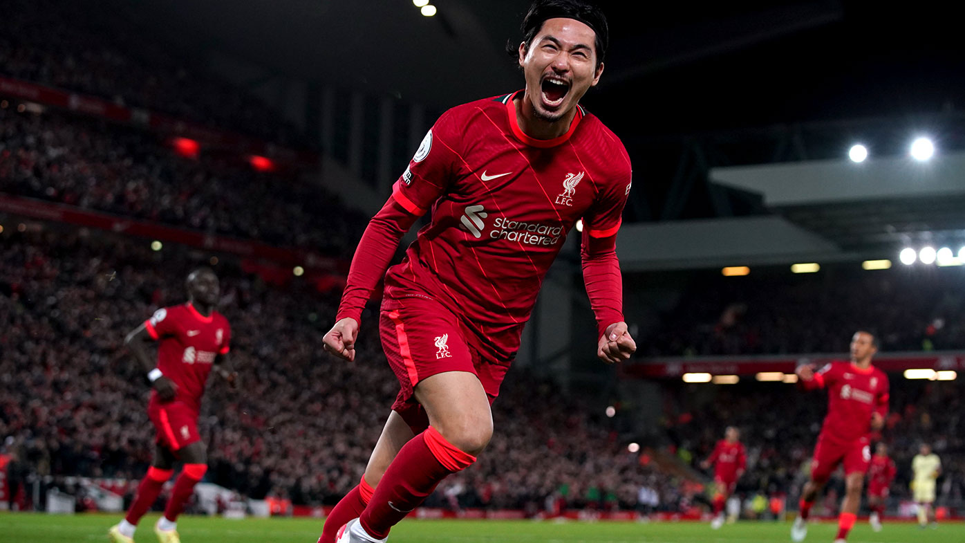 Liverpool's Takumi Minamino celebrates scoring